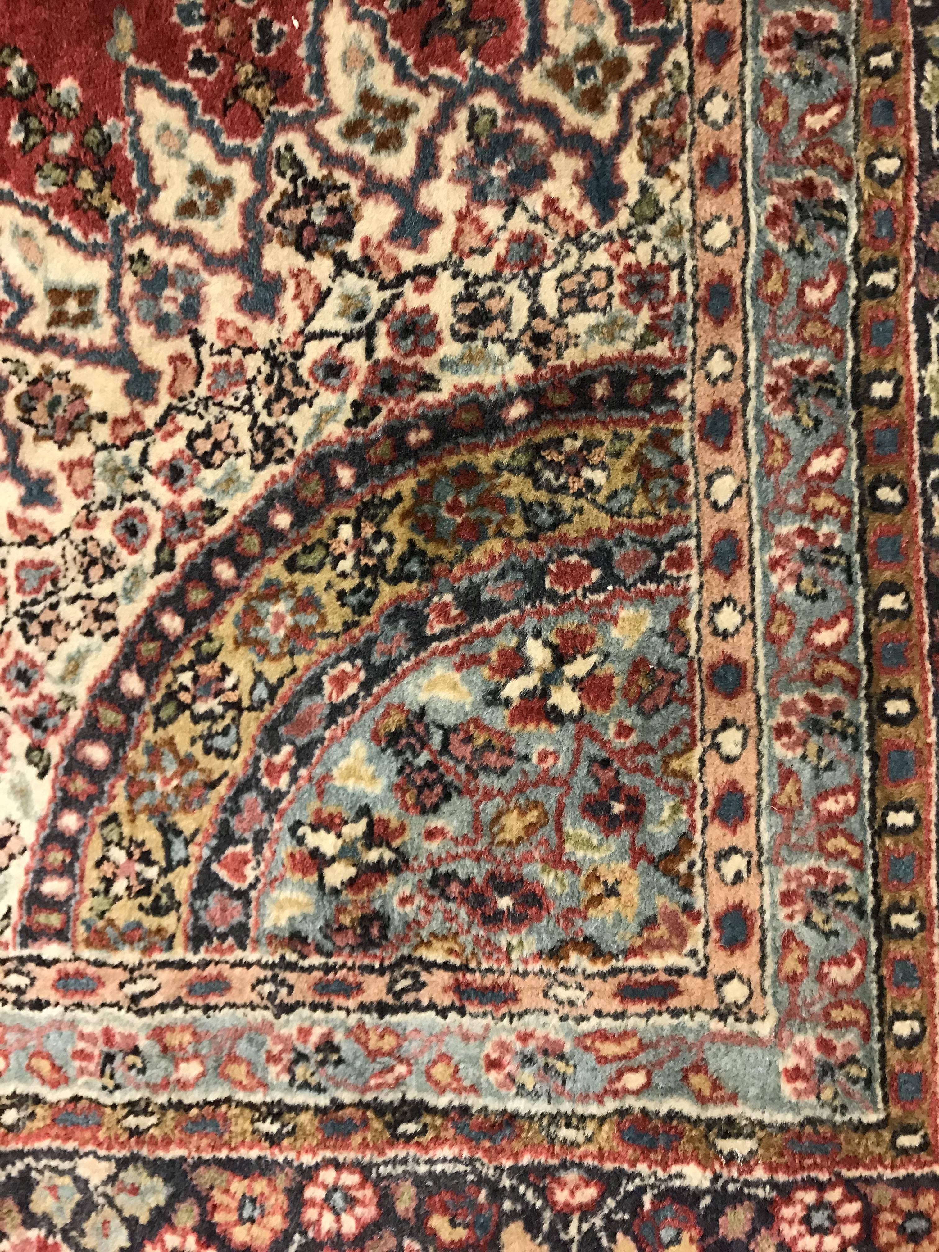 A pair of fine Oriental rugs, the central panel set with floral decorated circular medallion on a - Image 15 of 48