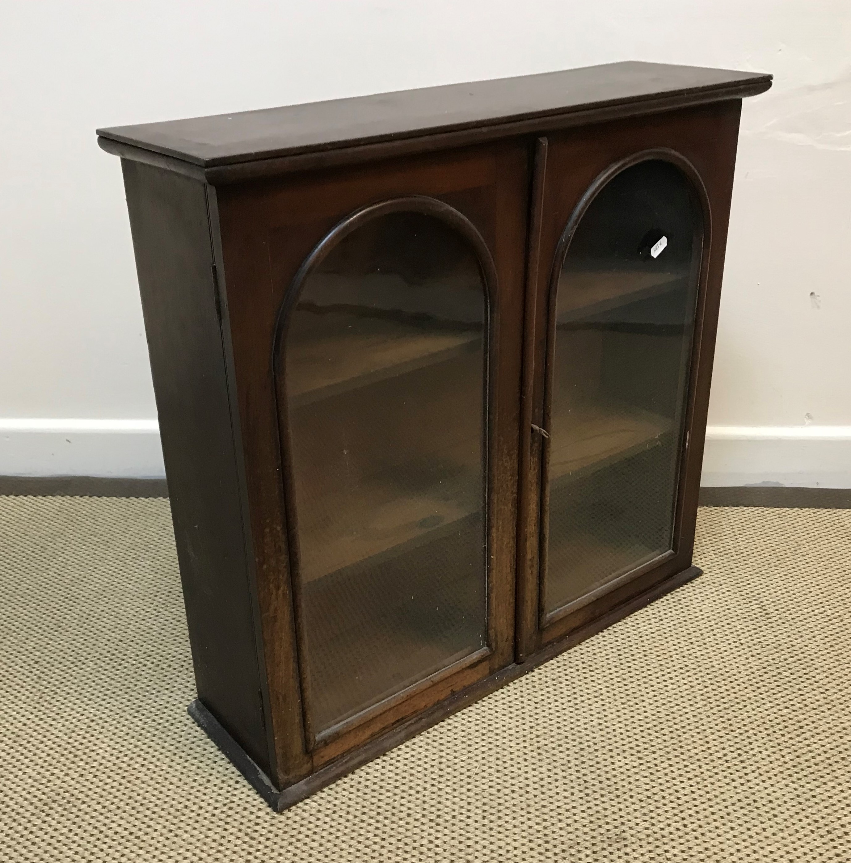 A Victorian oak revolving bookcase with side reading slope over slatted sides on a cruciform base to - Image 2 of 5