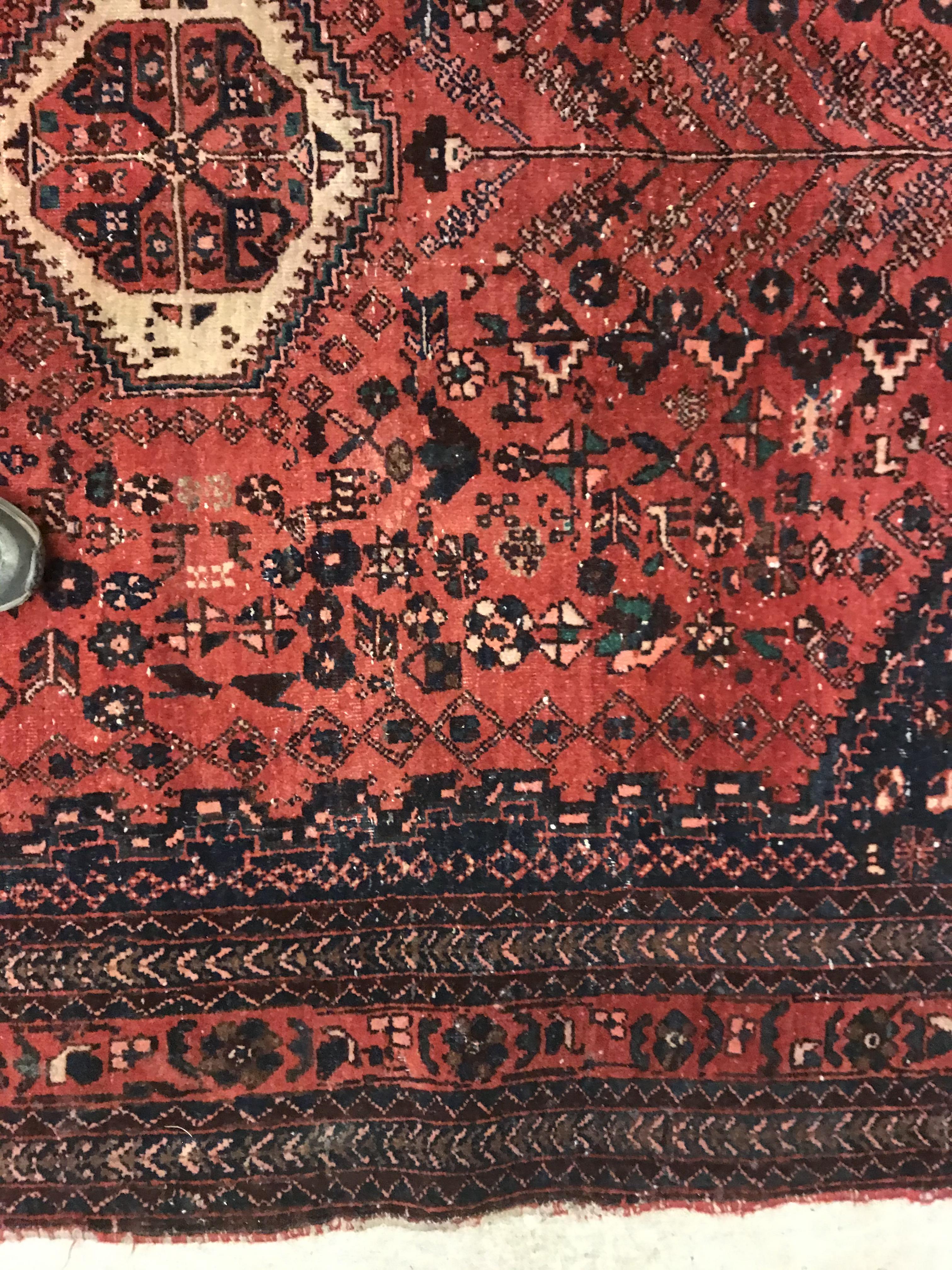 A Caucasian rug, the central panel set with three repeating medallions on a pale blue ground, within - Image 20 of 33