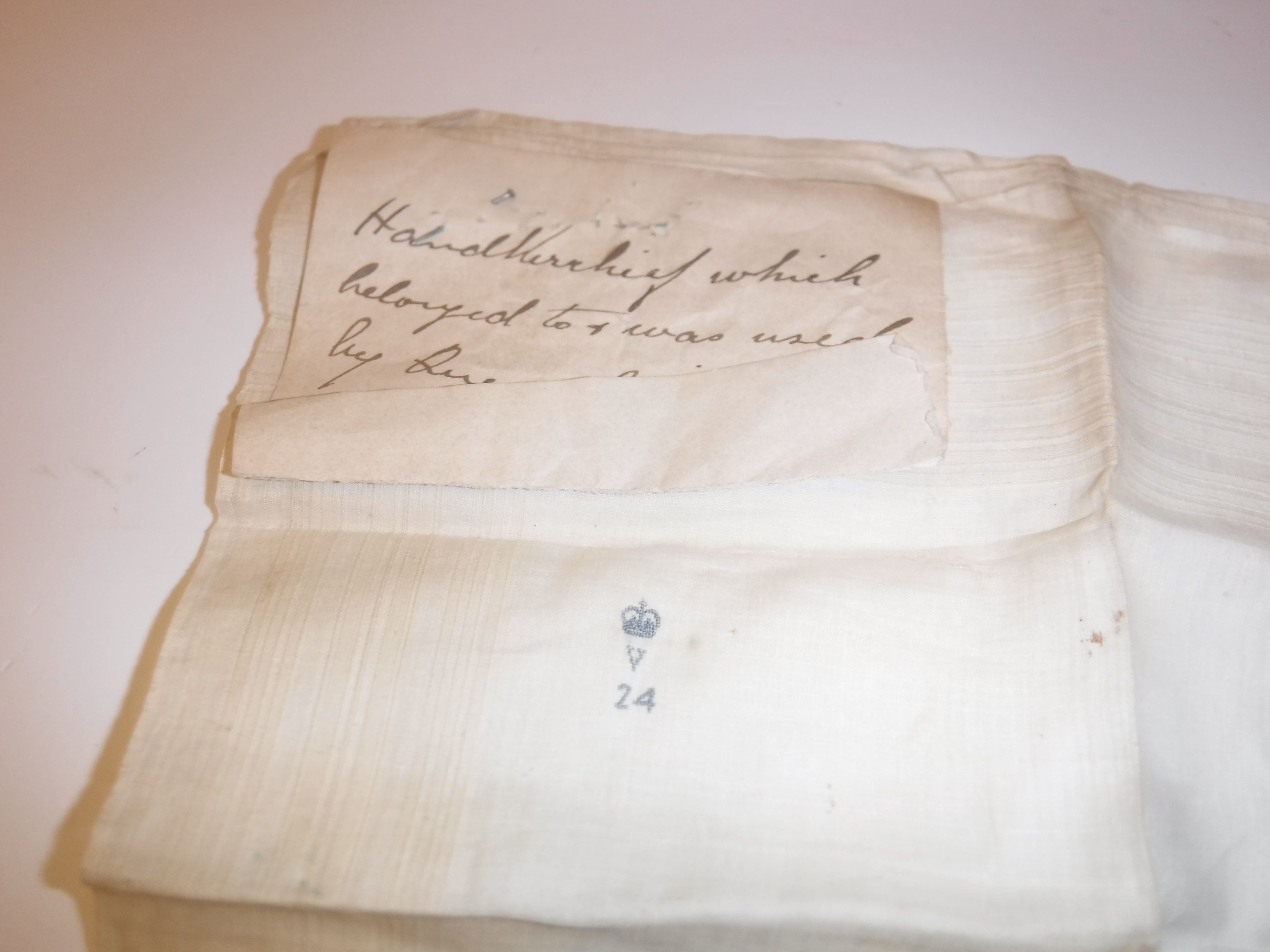 A fine lawn handkerchief, formerly the property of Queen Victoria, bearing blue needlework - Image 2 of 4