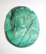 A 19th Century carved malachite bust medallion depicting "Flora", 3.5 cm x 2.9 cm