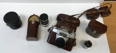 A Voigtländer Bessamatic camera, cased, together with Skoparex lens, Compur lens, Dynarex lens, etc