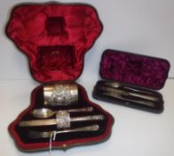 A late Victorian silver Christening set comprising mug, spoon, fork, knife and napkin ring, the