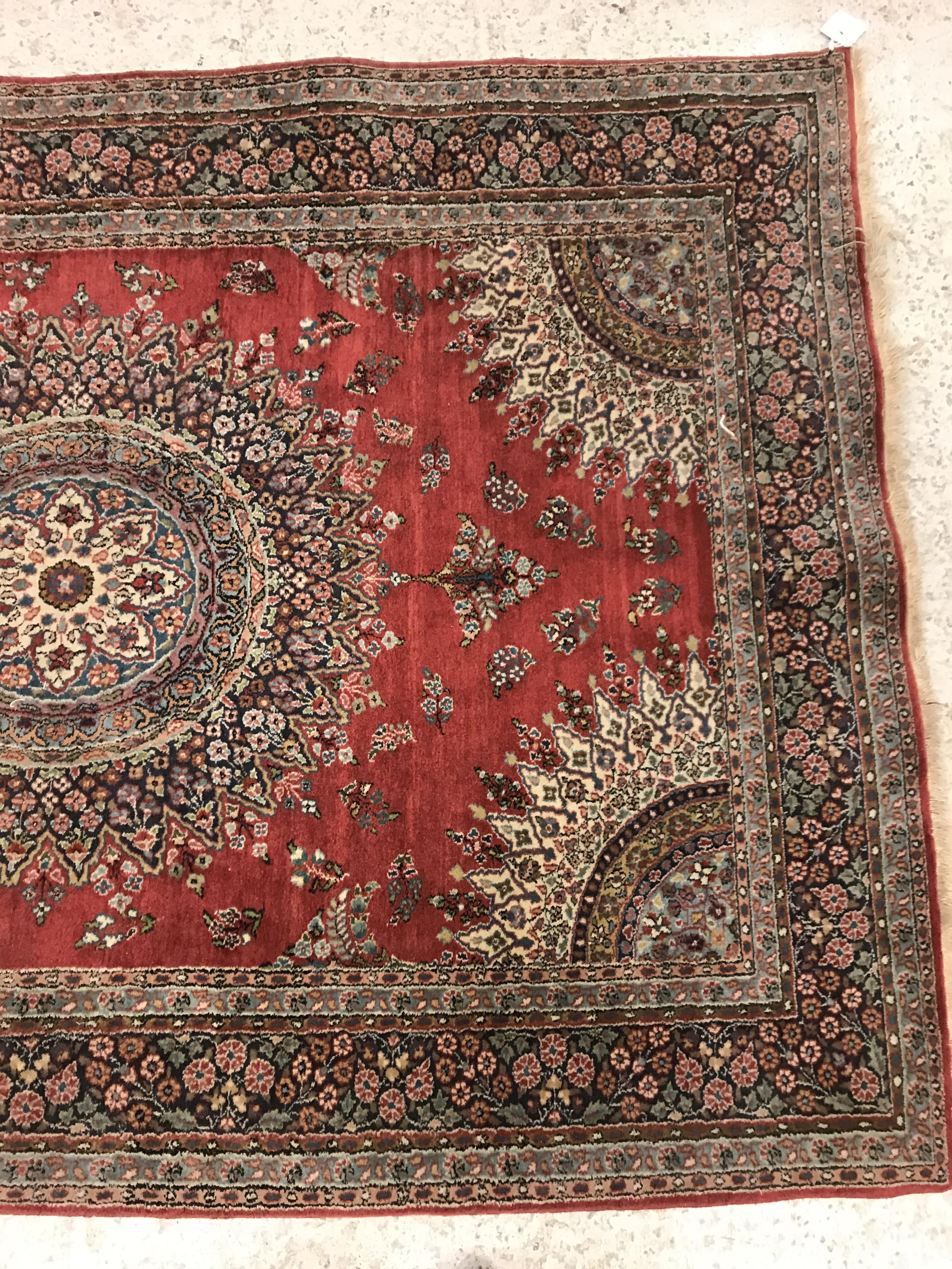 A pair of fine Oriental rugs, the central panel set with floral decorated circular medallion on a - Image 9 of 48