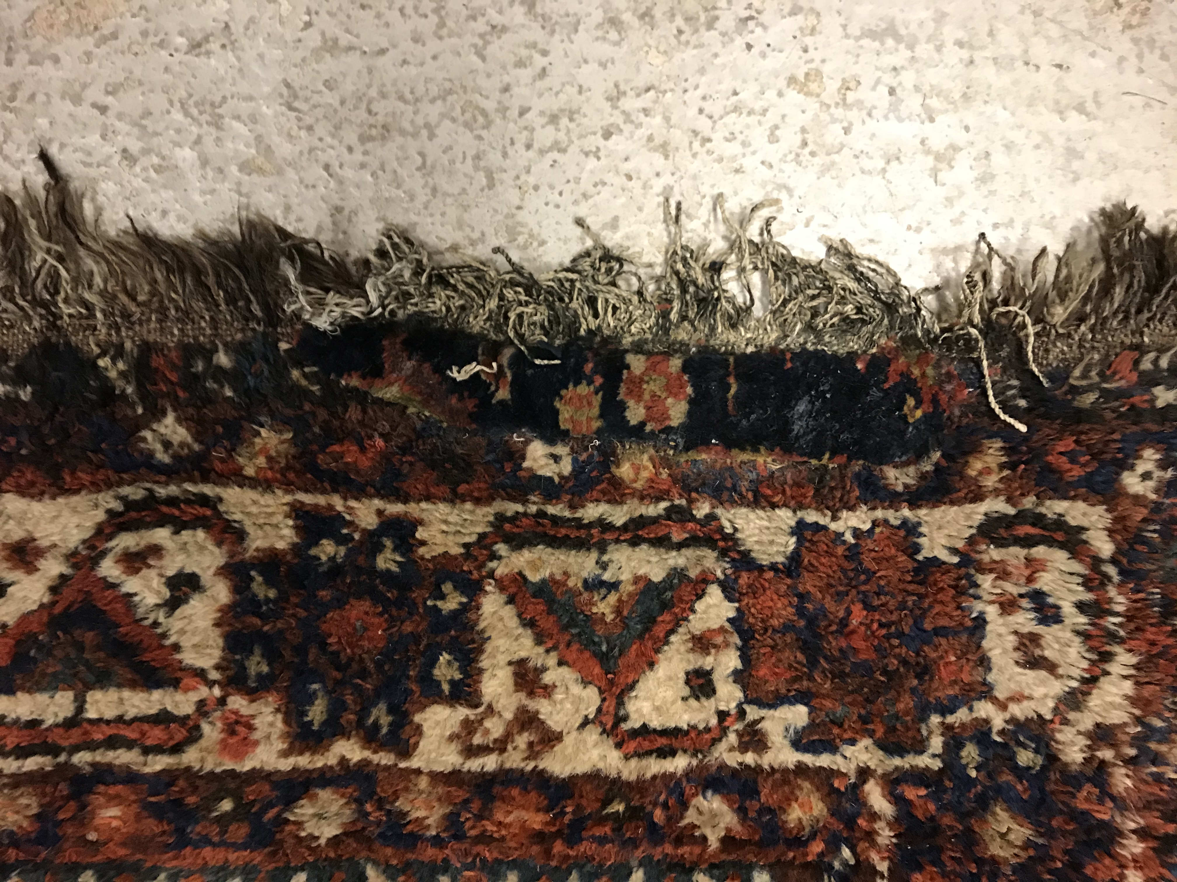 A Shiraz carpet, the central panel set with three joined diamond shaped medallions on a red and blue - Image 14 of 17