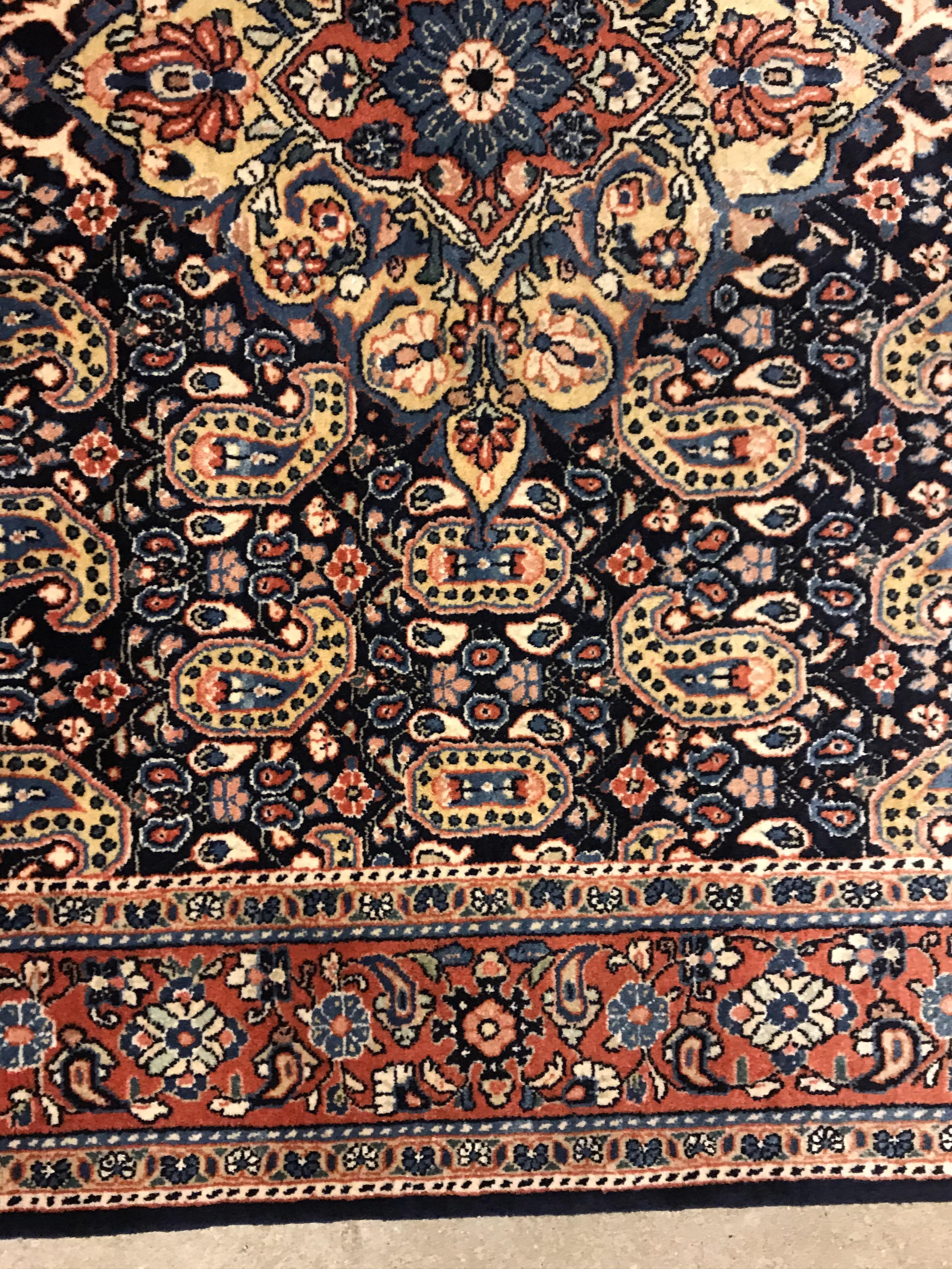 A Kashan carpet, the central panel set with floral decorated medallion on a dark blue hook decorated - Image 8 of 14