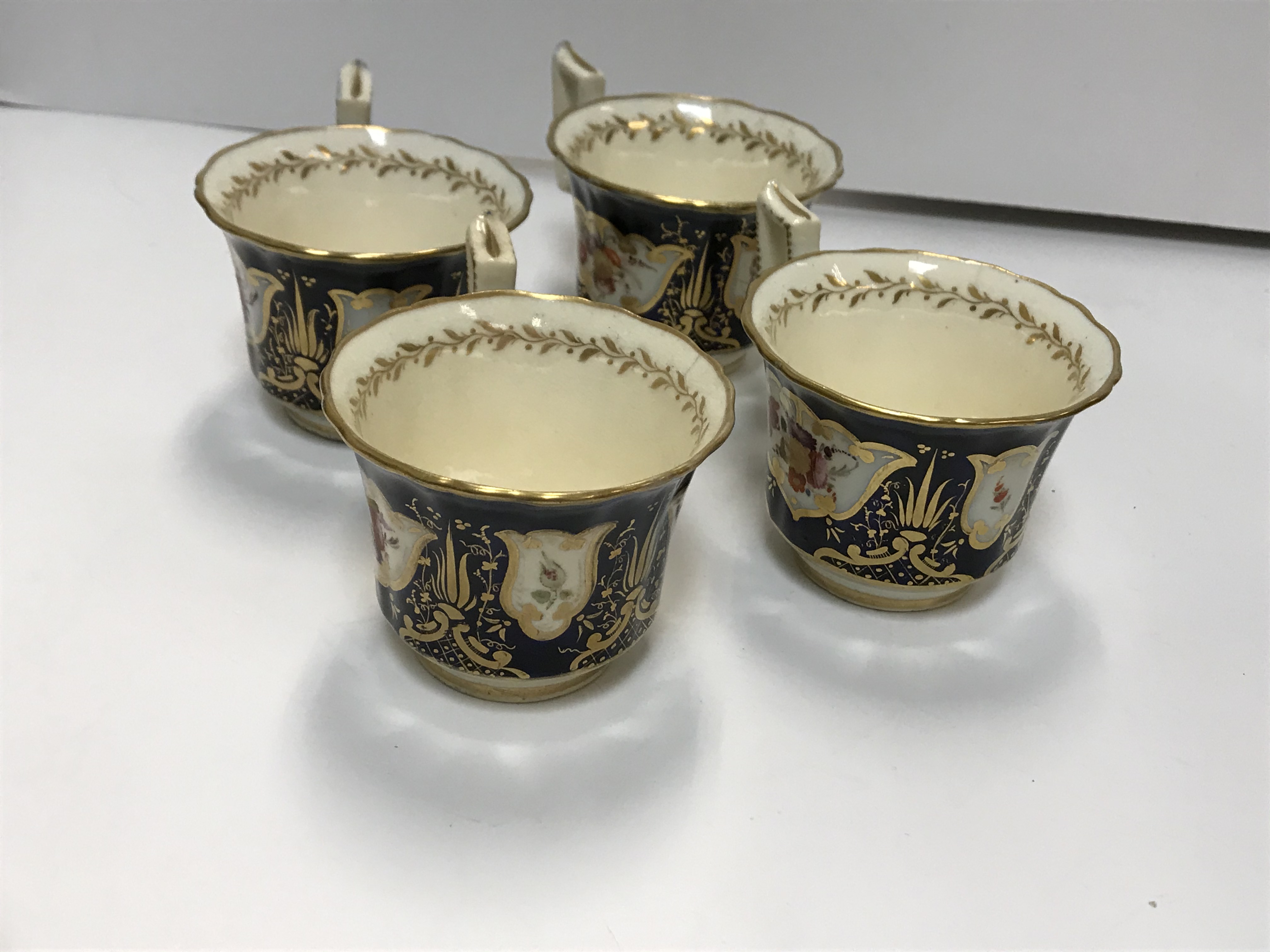 A 19th Century Staffordshire pottery part tea set, royal blue banded and gilt lined with panels of - Image 25 of 45