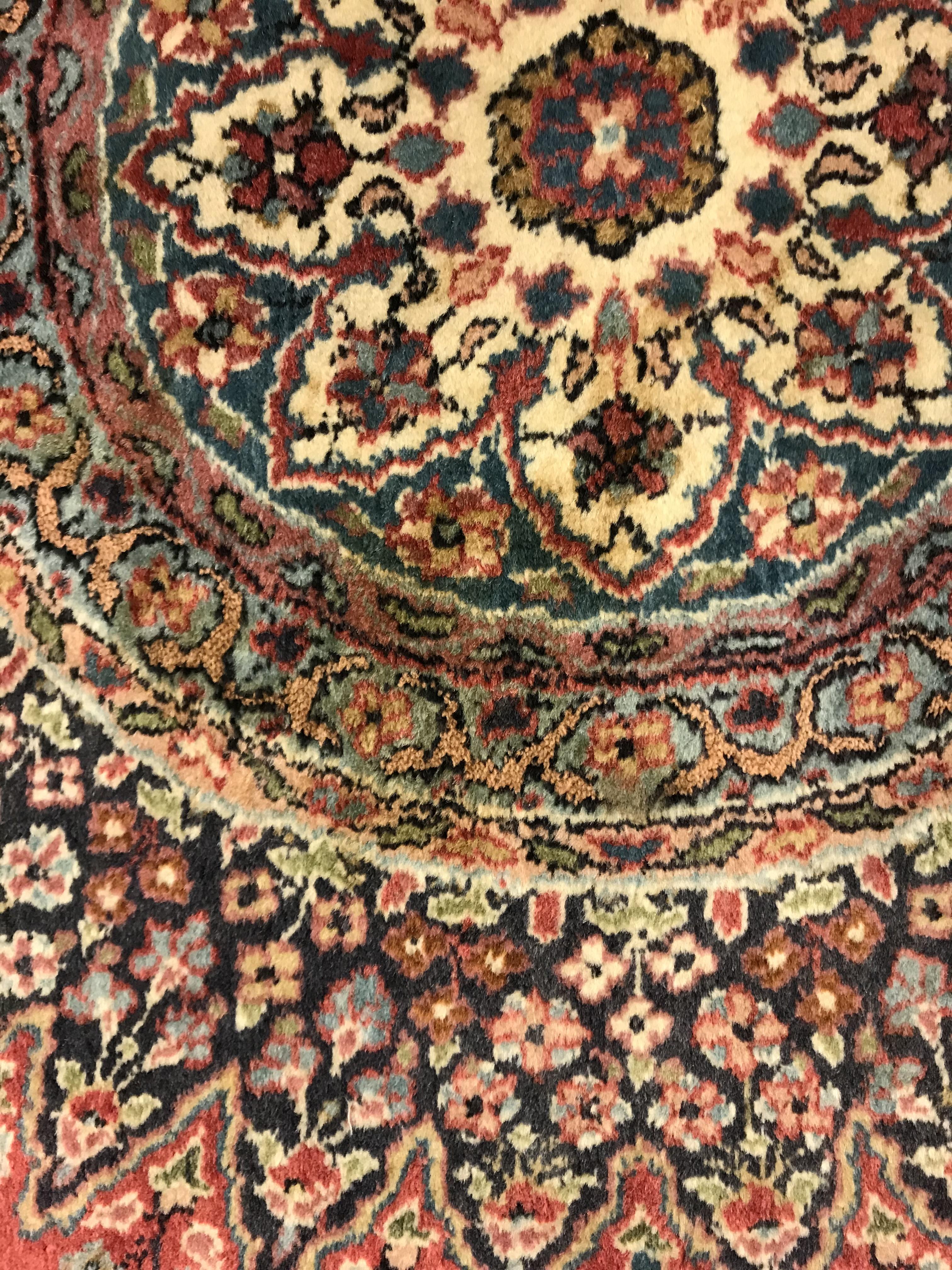 A pair of fine Oriental rugs, the central panel set with floral decorated circular medallion on a - Image 10 of 48