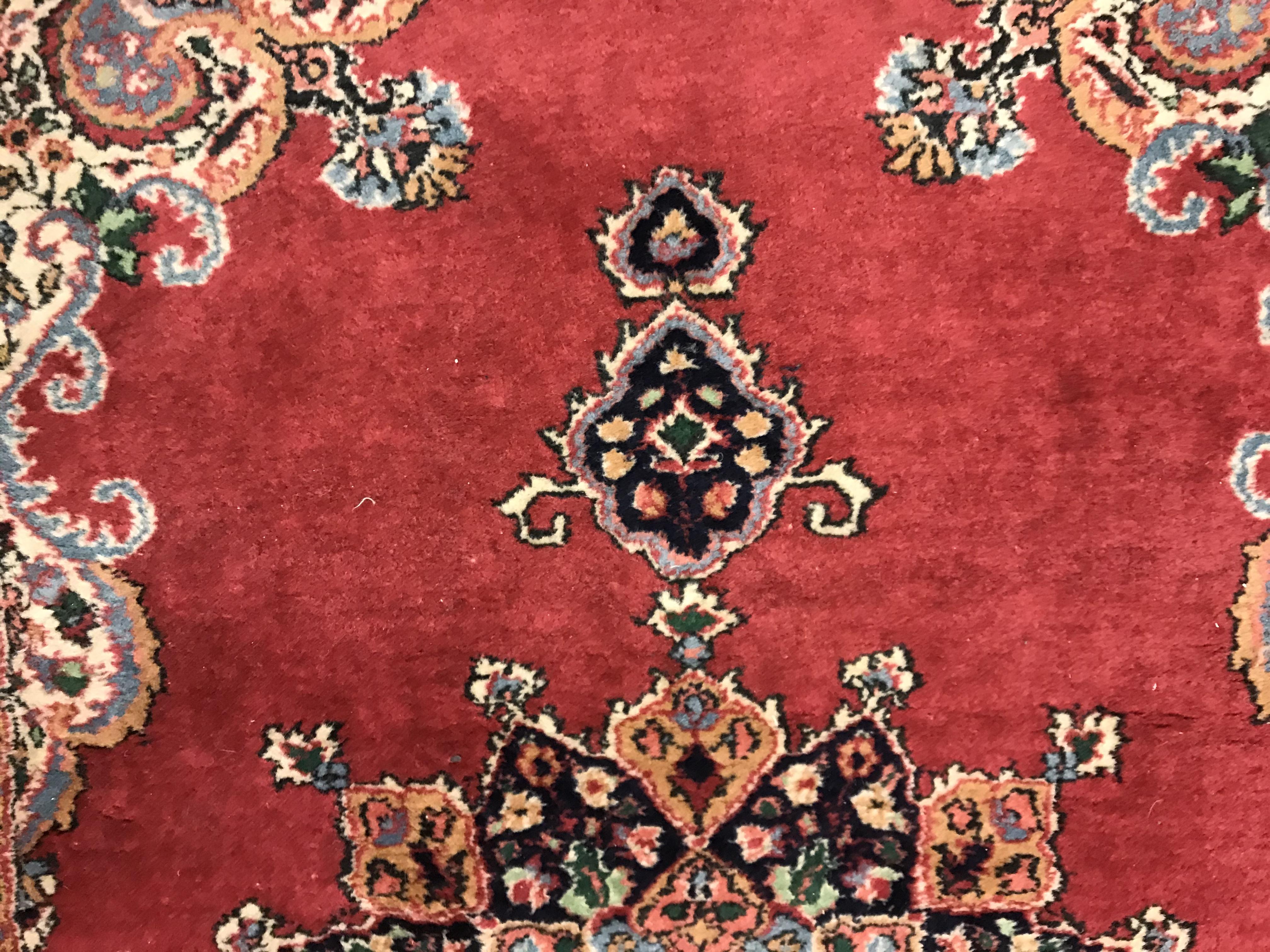 A pair of fine Oriental rugs, the central panels set with floral decorated circular medallion on a - Image 10 of 41