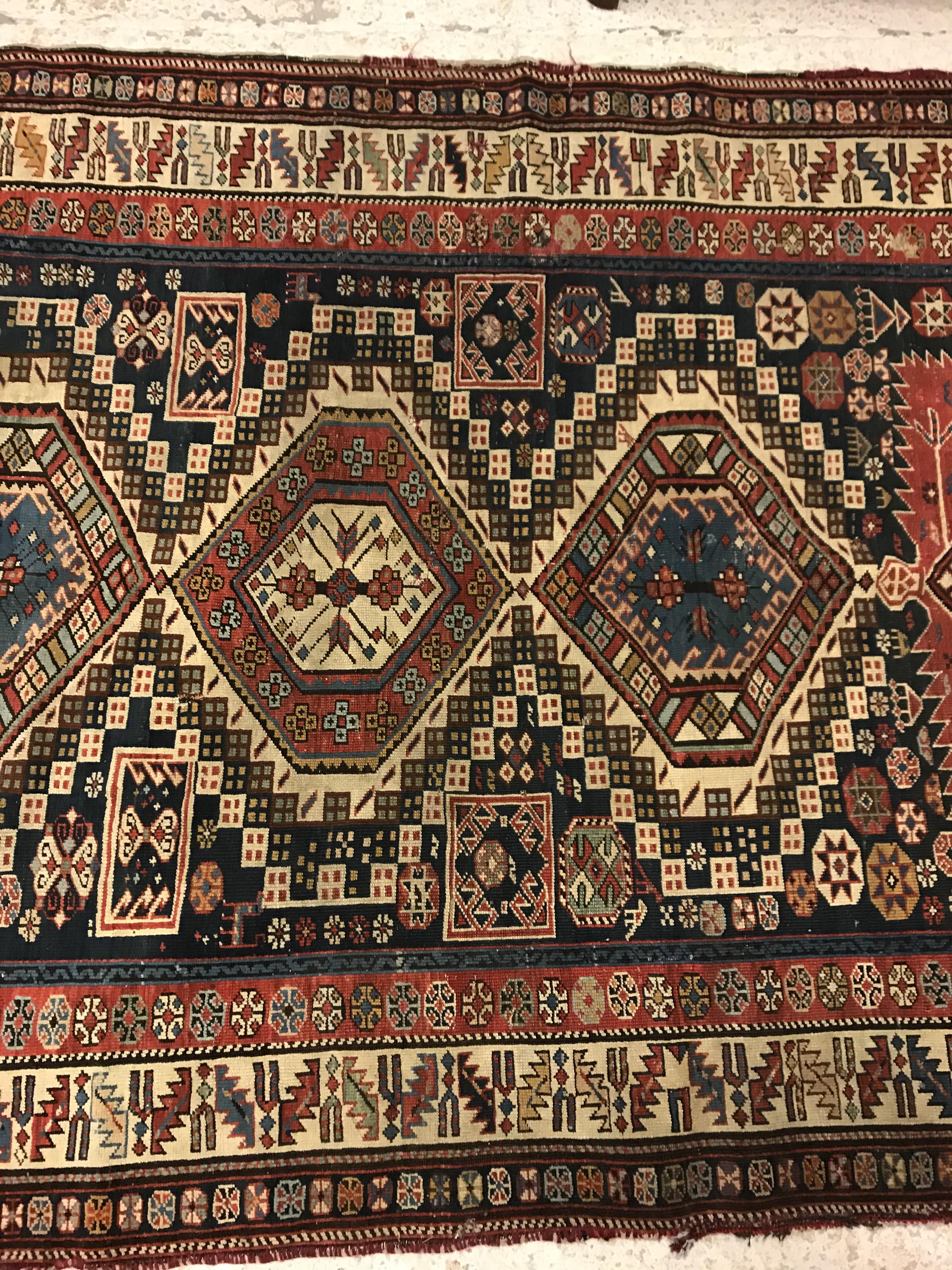 A fine Shirvan runner, the central panel set with repeating medallions on a dark blue stylised - Image 5 of 8