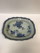 An 18th Century Chinese blue and white shaped rectangular platter with floral spray decoration to