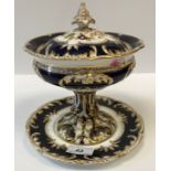 A 19th Century royal blue and gilt decorated and floral spray painted pedestal dish and cover on