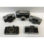 A collection of six various cameras including an Edixa 16-S mini camera, an Olympus Pen-D camera,