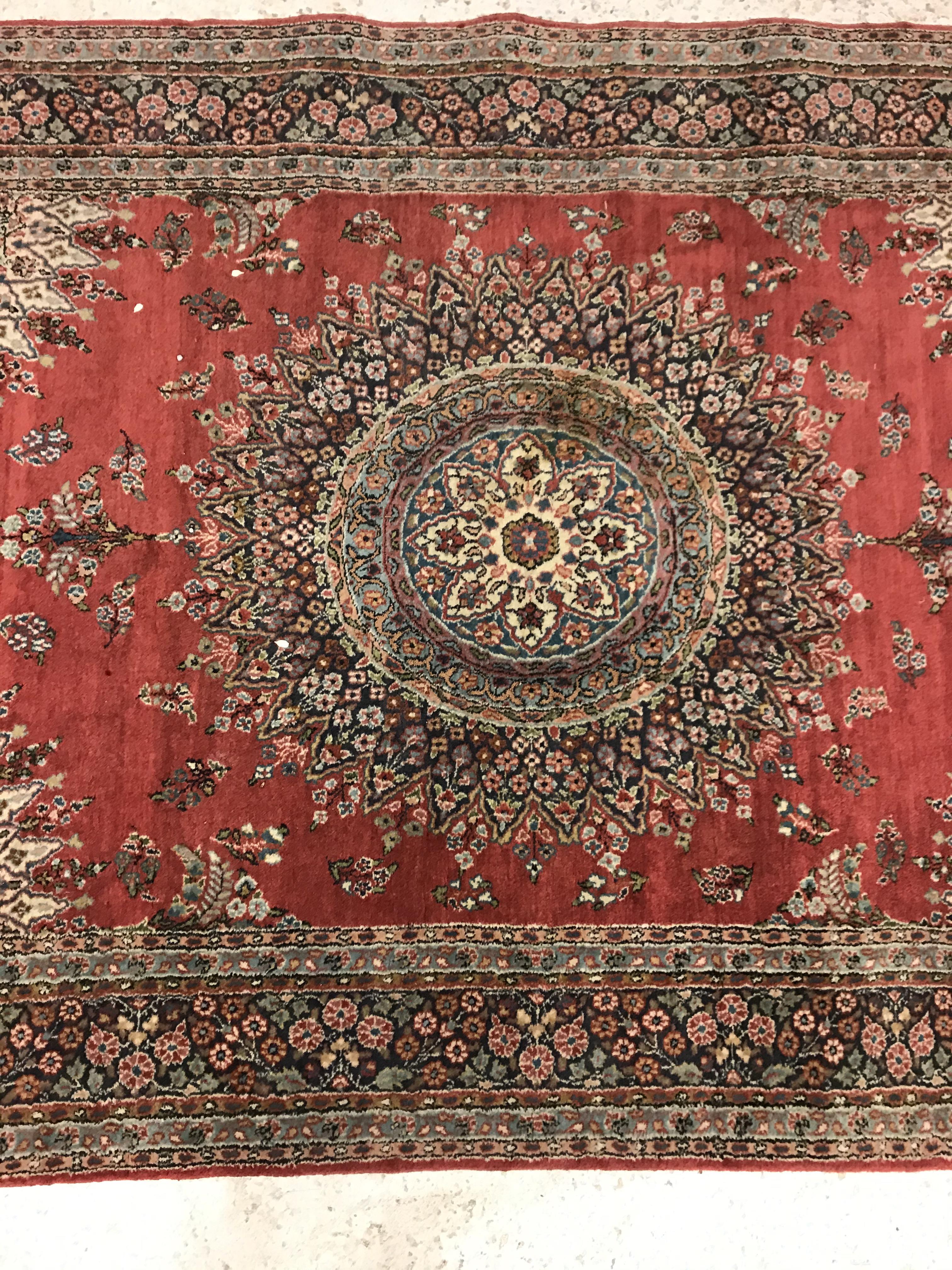 A pair of fine Oriental rugs, the central panel set with floral decorated circular medallion on a - Image 3 of 48