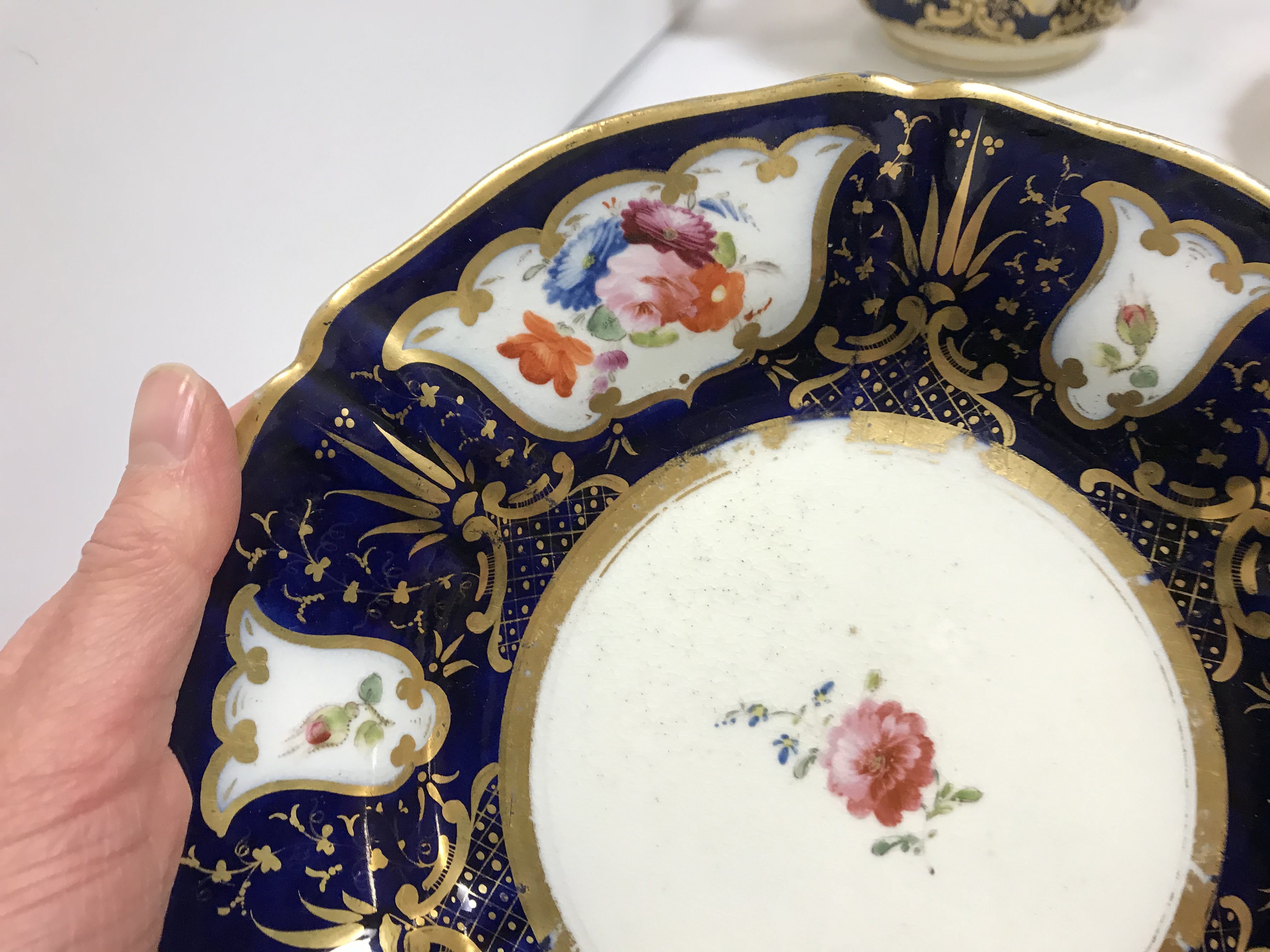 A 19th Century Staffordshire pottery part tea set, royal blue banded and gilt lined with panels of - Image 15 of 45