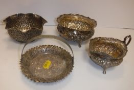 A Victorian embossed silver sugar bowl and cream jug with gilt-washed interior, the main body