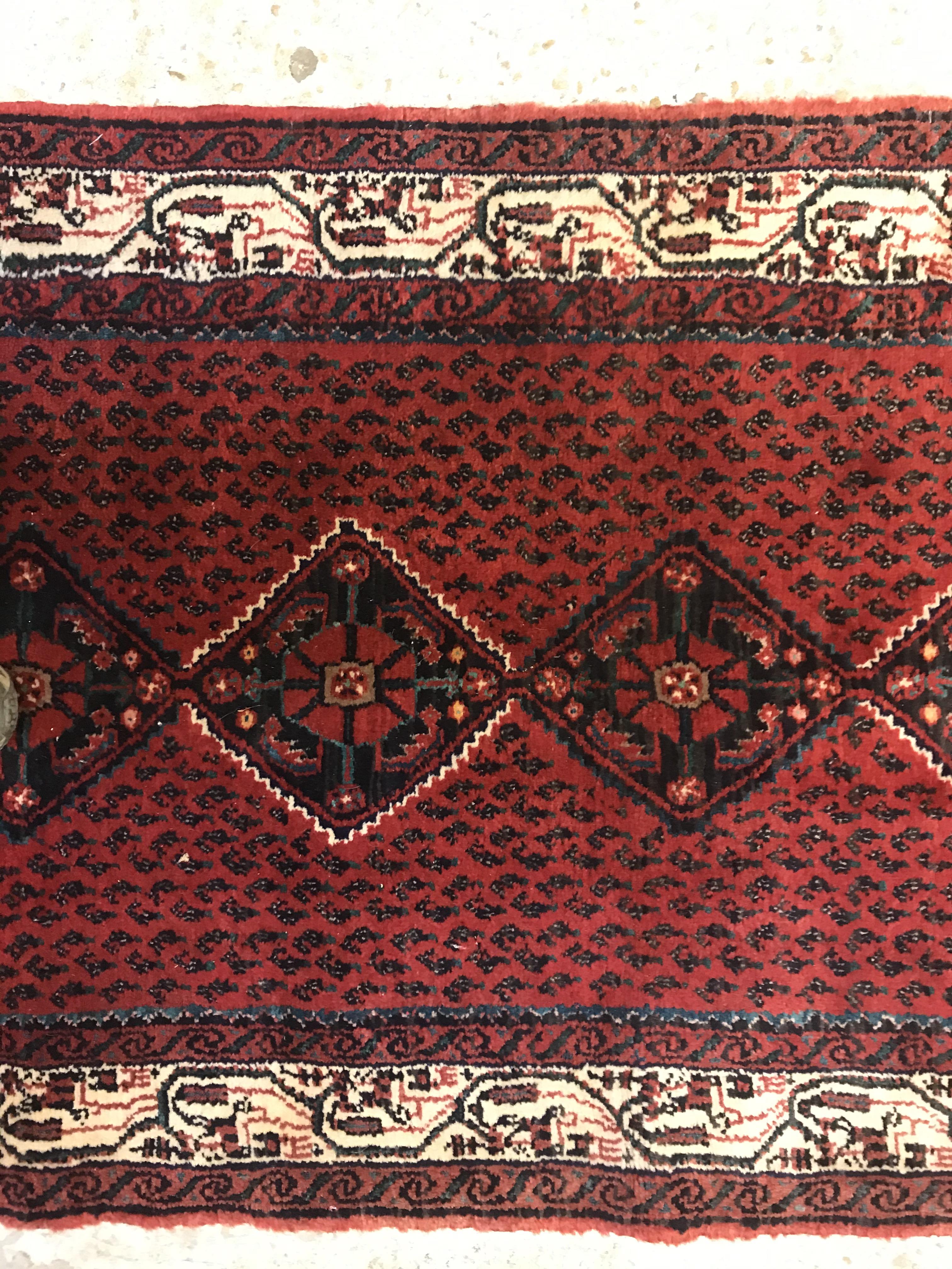 A modern Persian (Iran) runner, the red ground with repeating lozenge medallion with hook style - Image 8 of 23