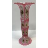 A Victorian pink overlaid milk glass gilt and polychrome floral spray decorated trumpet shaped