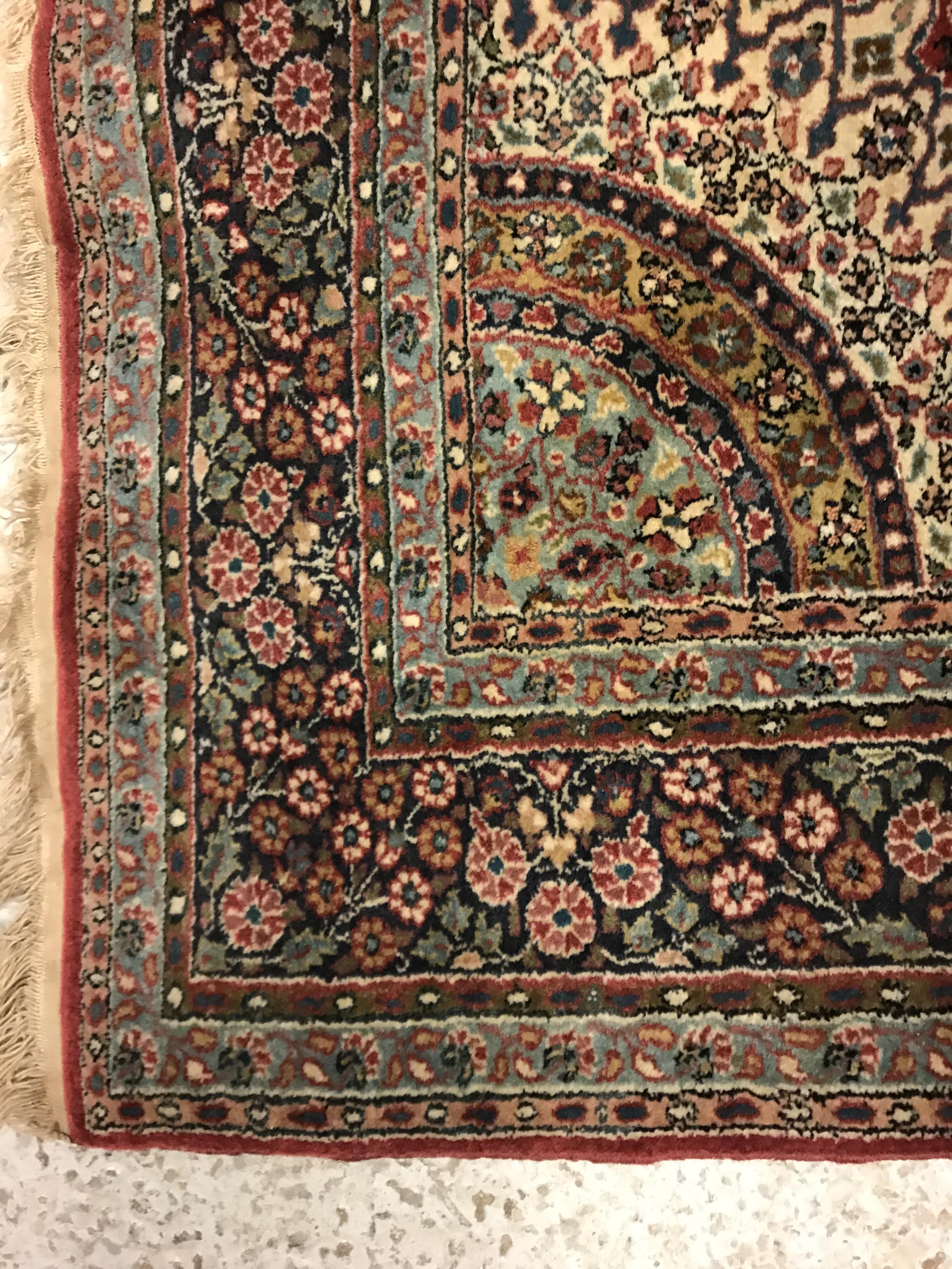 A pair of fine Oriental rugs, the central panel set with floral decorated circular medallion on a - Image 28 of 48