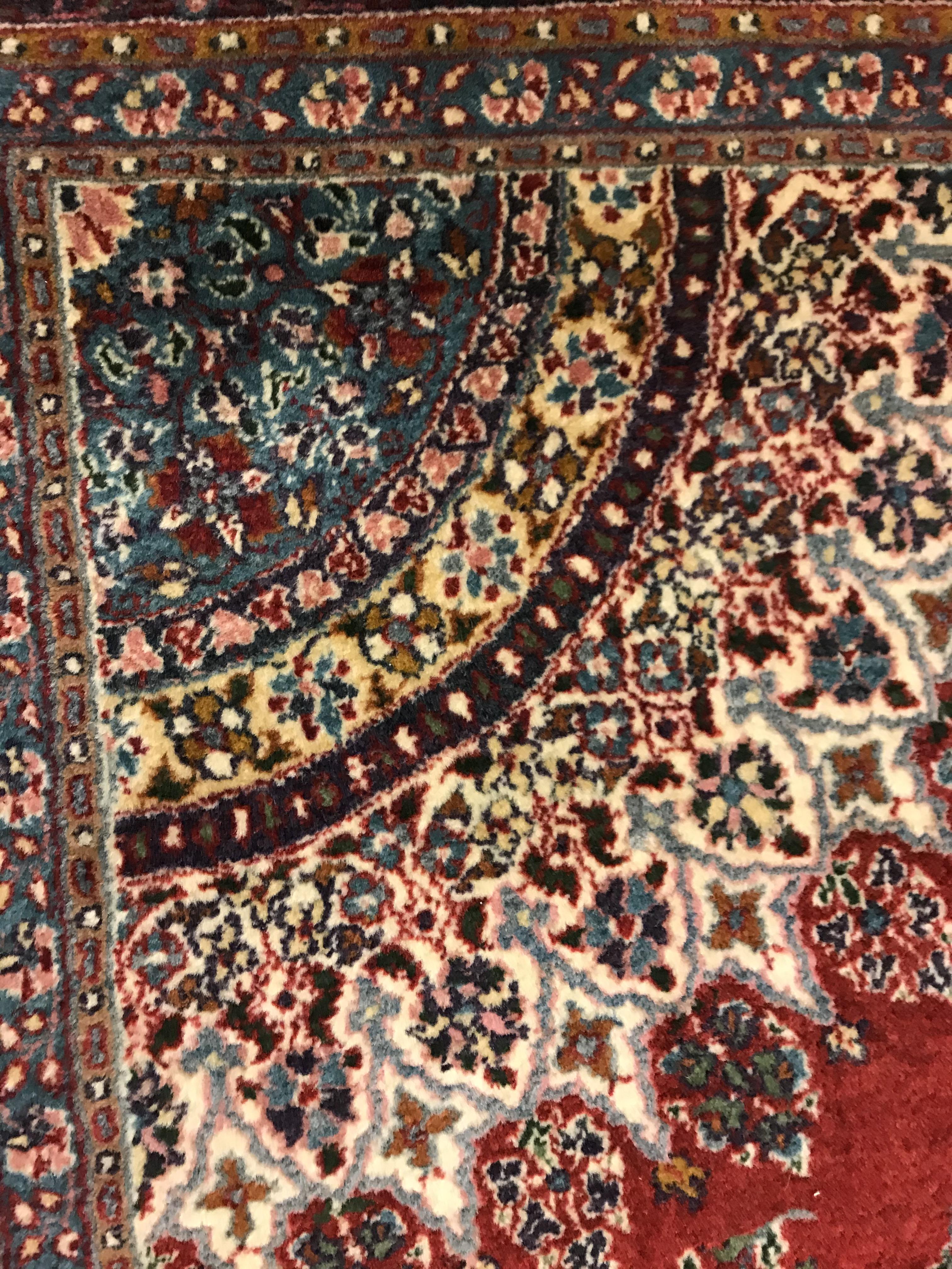 A pair of fine Oriental rugs, the central panels each set with floral decorated circular medallion - Image 16 of 41