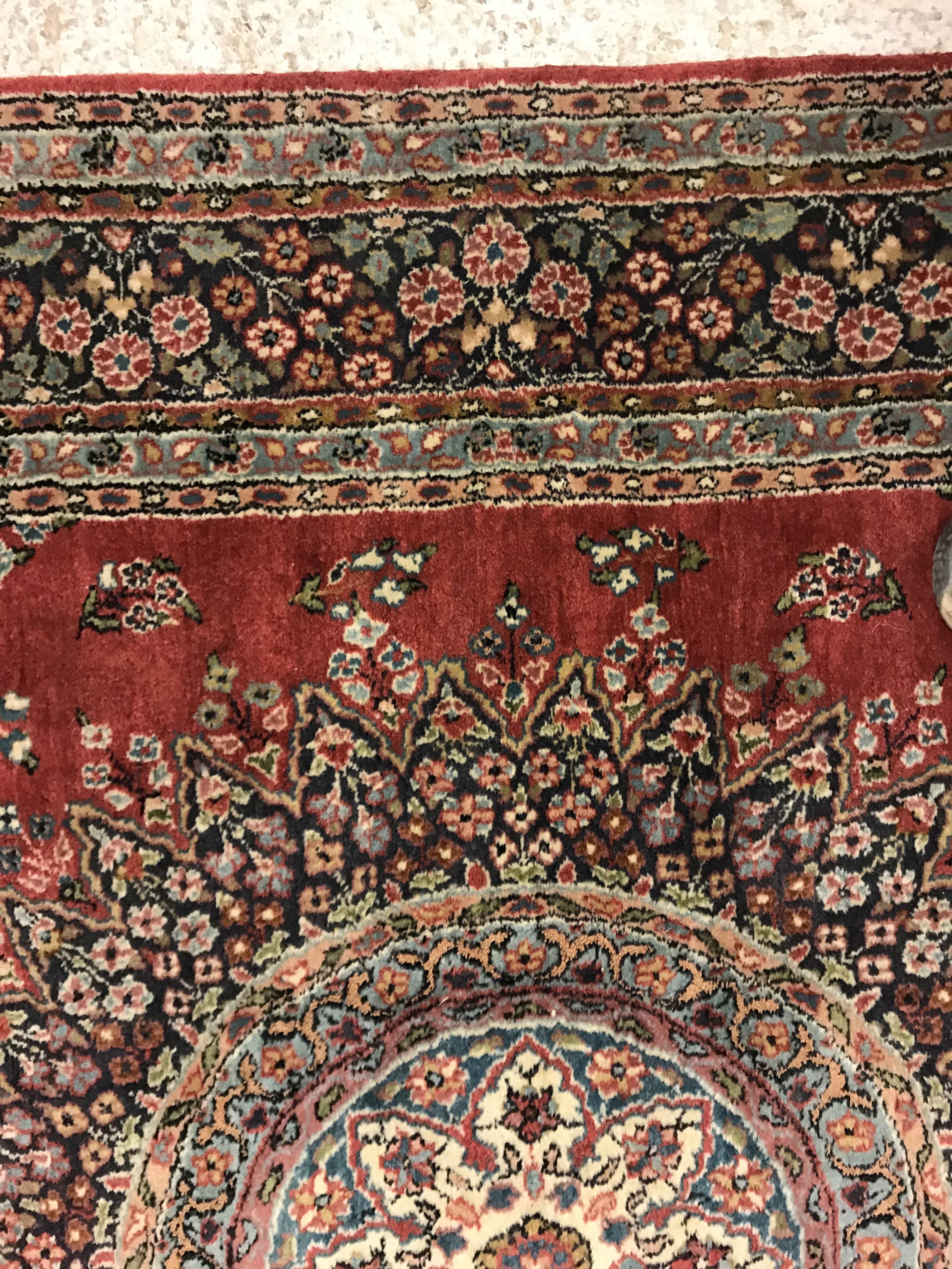 A pair of fine Oriental rugs, the central panel set with floral decorated circular medallion on a - Image 24 of 48