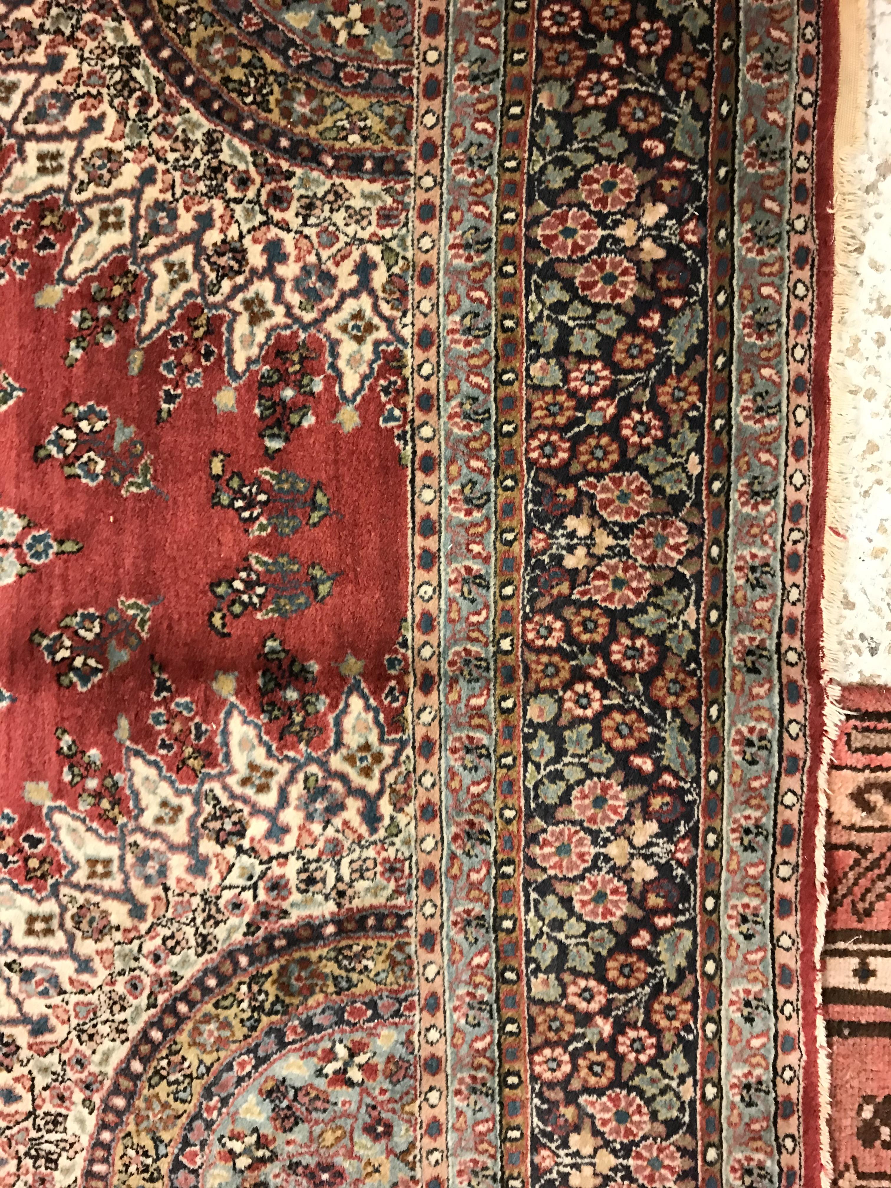 A pair of fine Oriental rugs, the central panel set with floral decorated circular medallion on a - Image 17 of 48