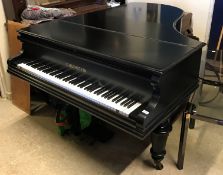 A Bechstein Model B grand piano in ebonised case, with iron framed over strung movement, raised on