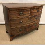 A 19th Century mahogany bow fronted chest of two short over two long graduated drawers on splayed