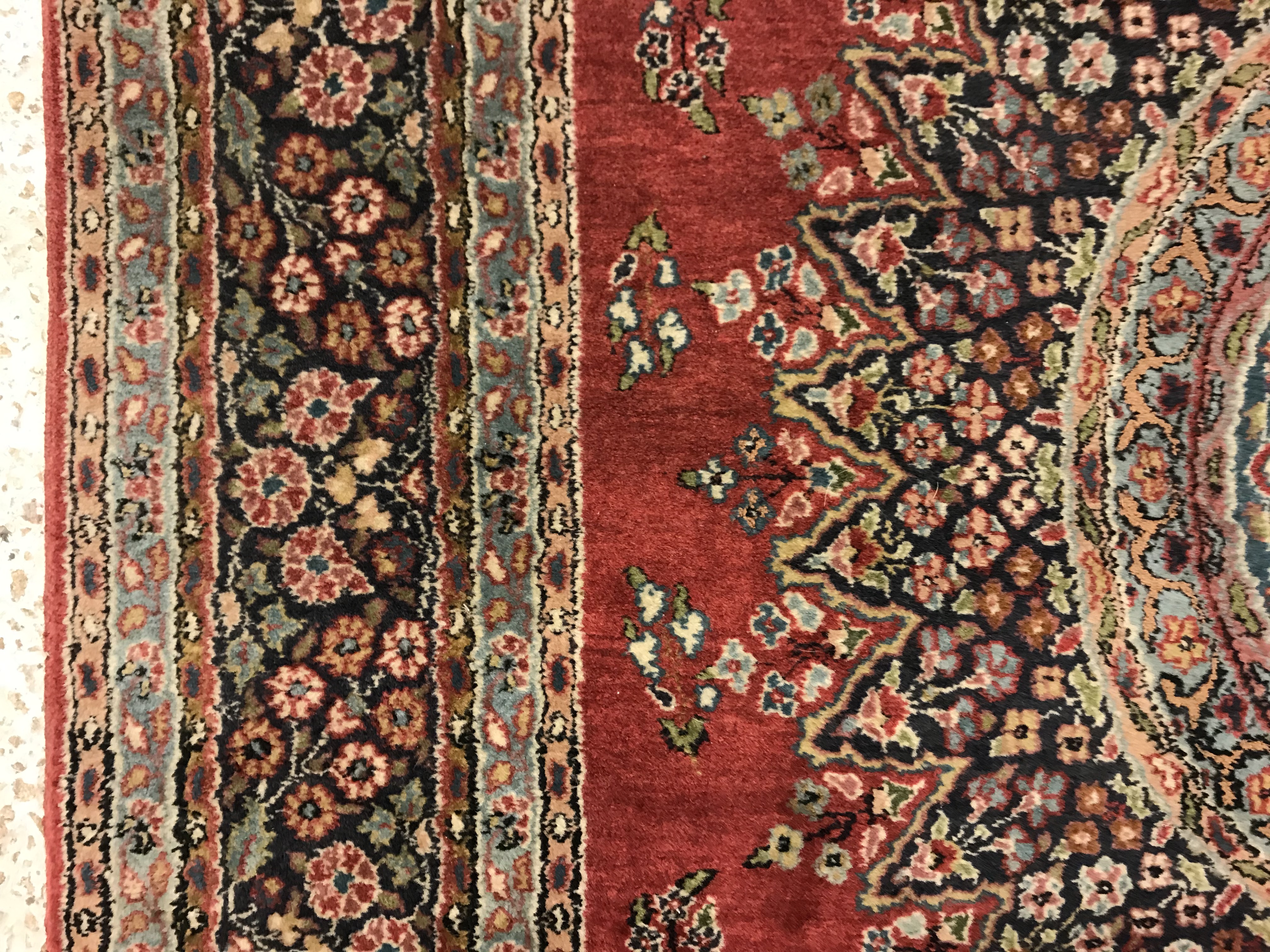 A pair of fine Oriental rugs, the central panel set with floral decorated circular medallion on a - Image 39 of 48
