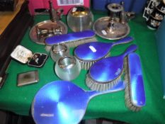 A silver and blue enamel decorated five piece dressing table brush / mirror set, two silver