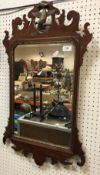 A 20th Century Italian carved and painted easel mirror in the Rococo taste, 74 cm x 46 cm,