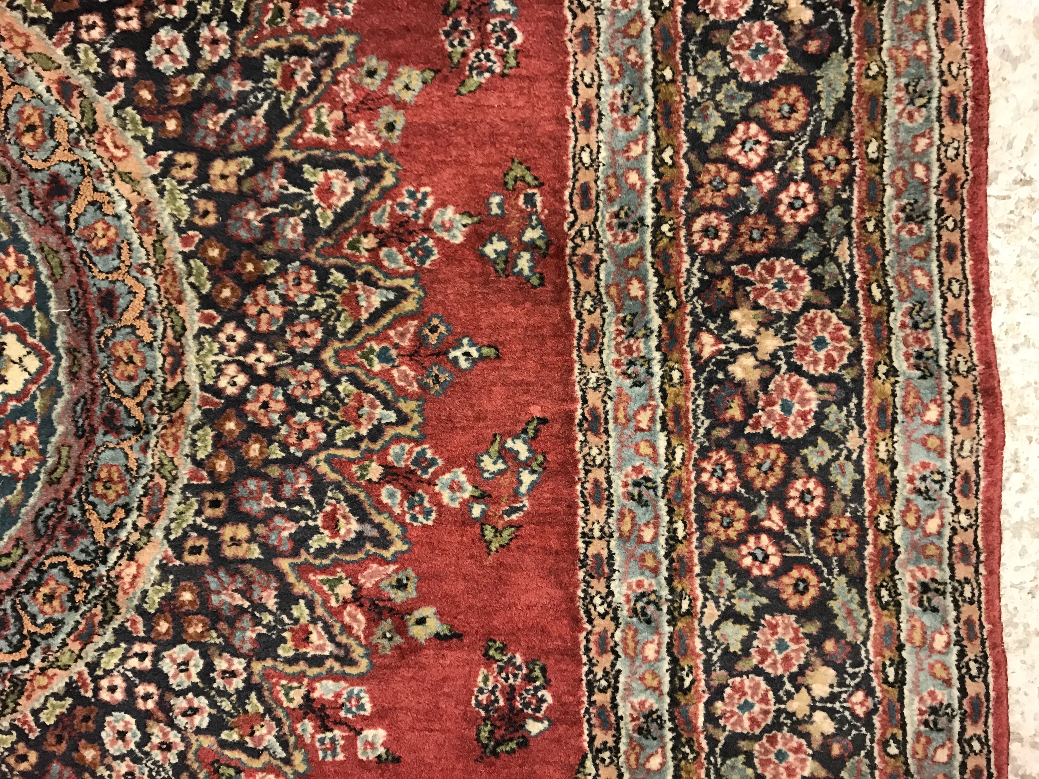 A pair of fine Oriental rugs, the central panel set with floral decorated circular medallion on a - Image 41 of 48