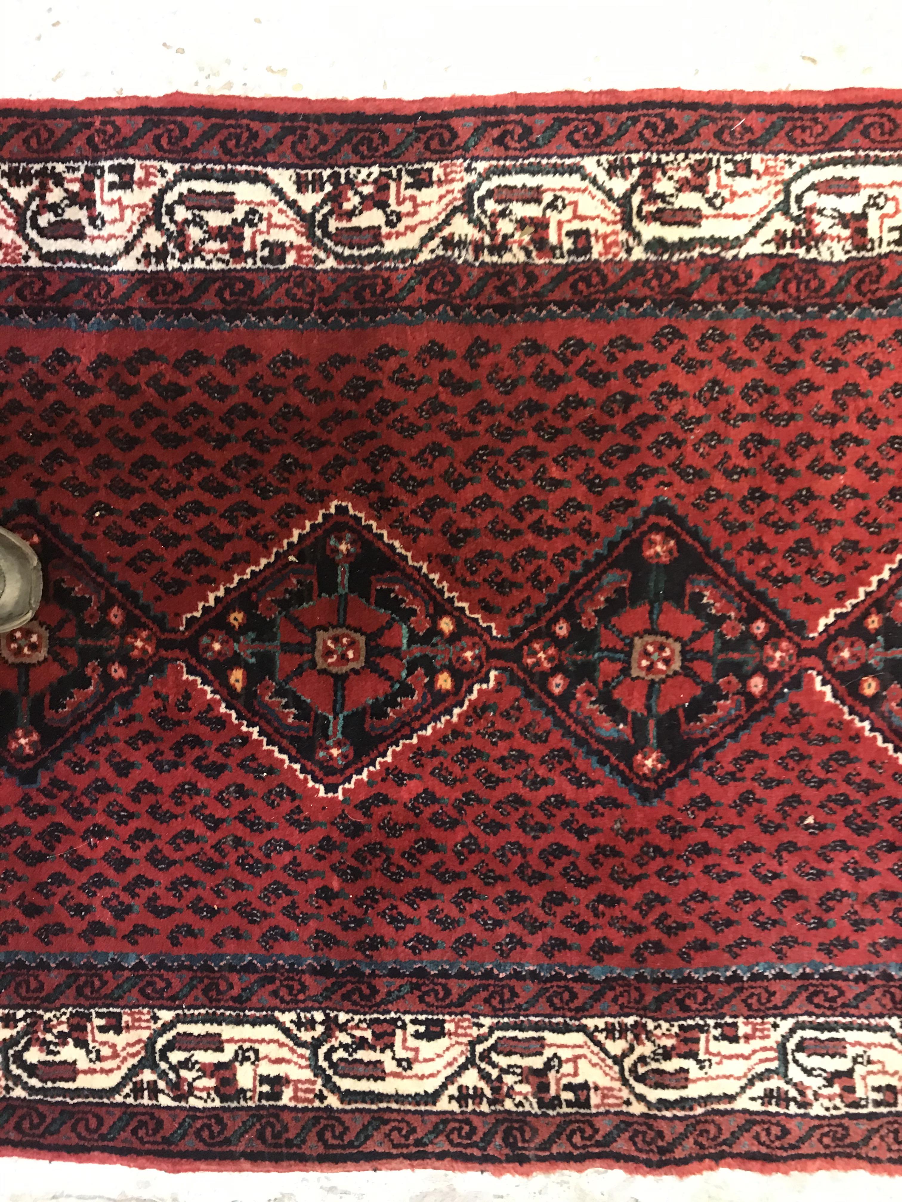 A modern Persian (Iran) runner, the red ground with repeating lozenge medallion with hook style - Image 7 of 23