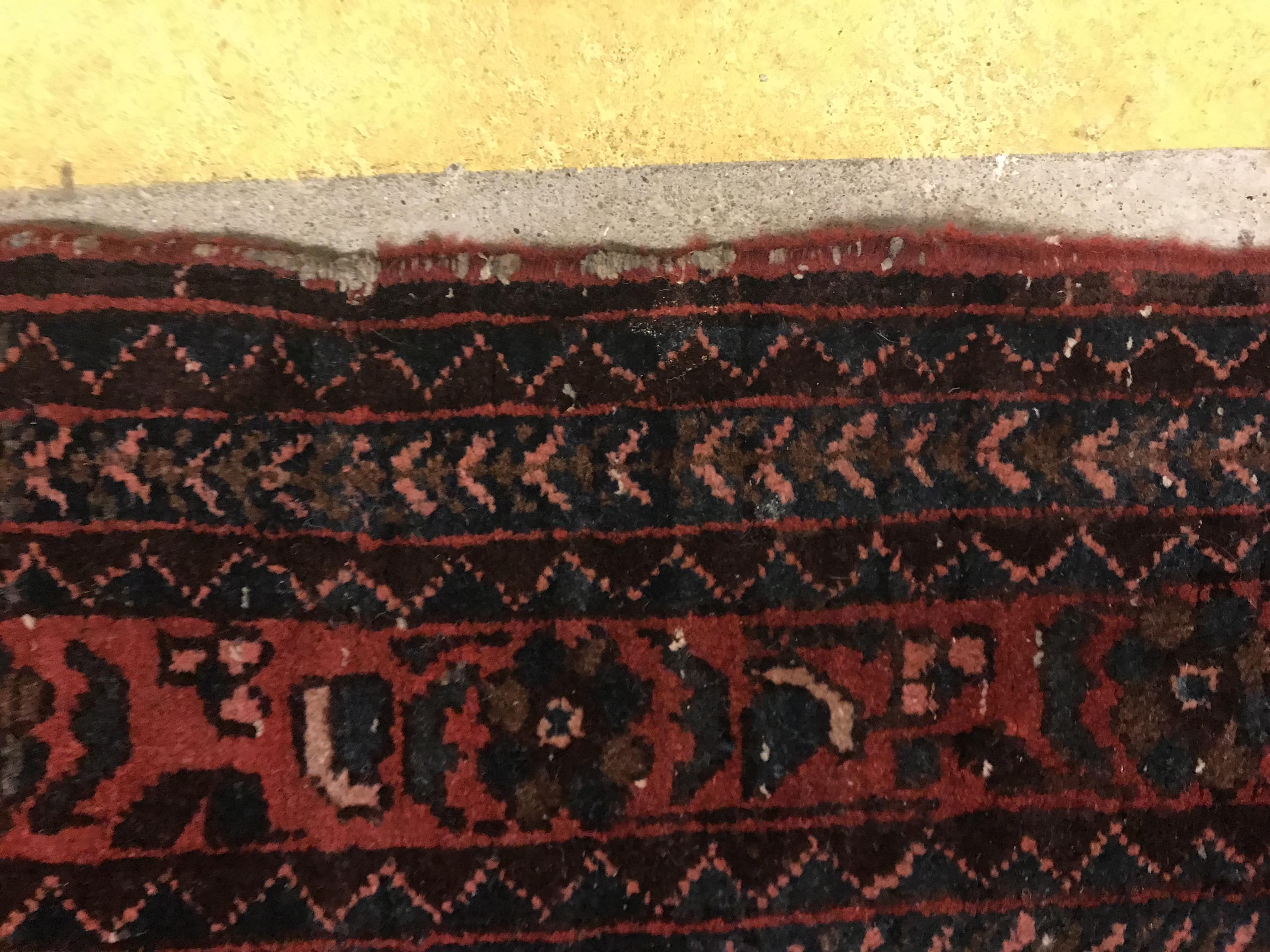 A Caucasian rug, the central panel set with three repeating medallions on a pale blue ground, within - Image 24 of 33