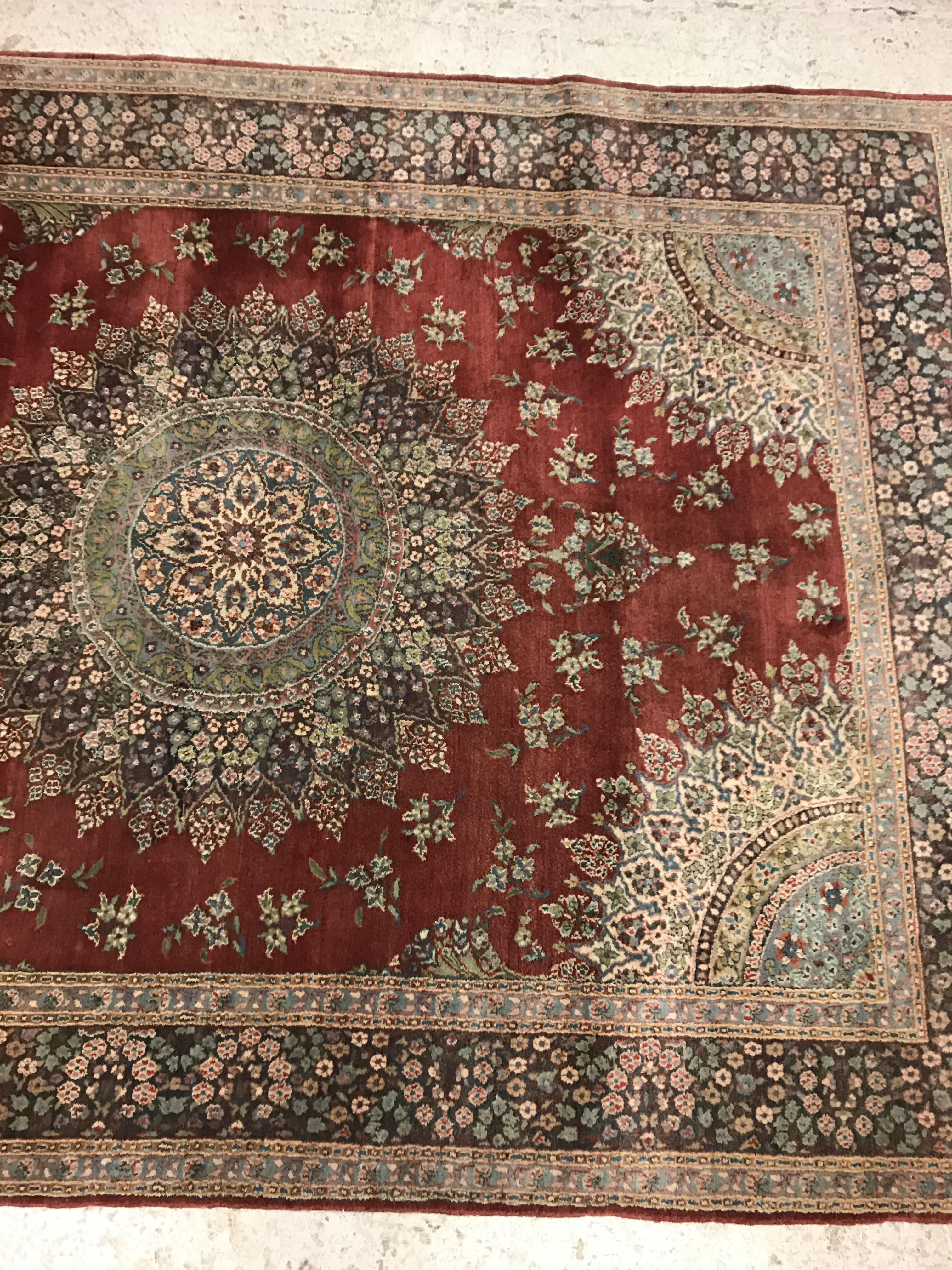 A pair of fine Oriental rugs, the central panels each set with floral decorated circular medallion - Image 4 of 41