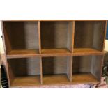 A suite of oak open bookshelves, some with sliding doors, others with pigeon holesCondition