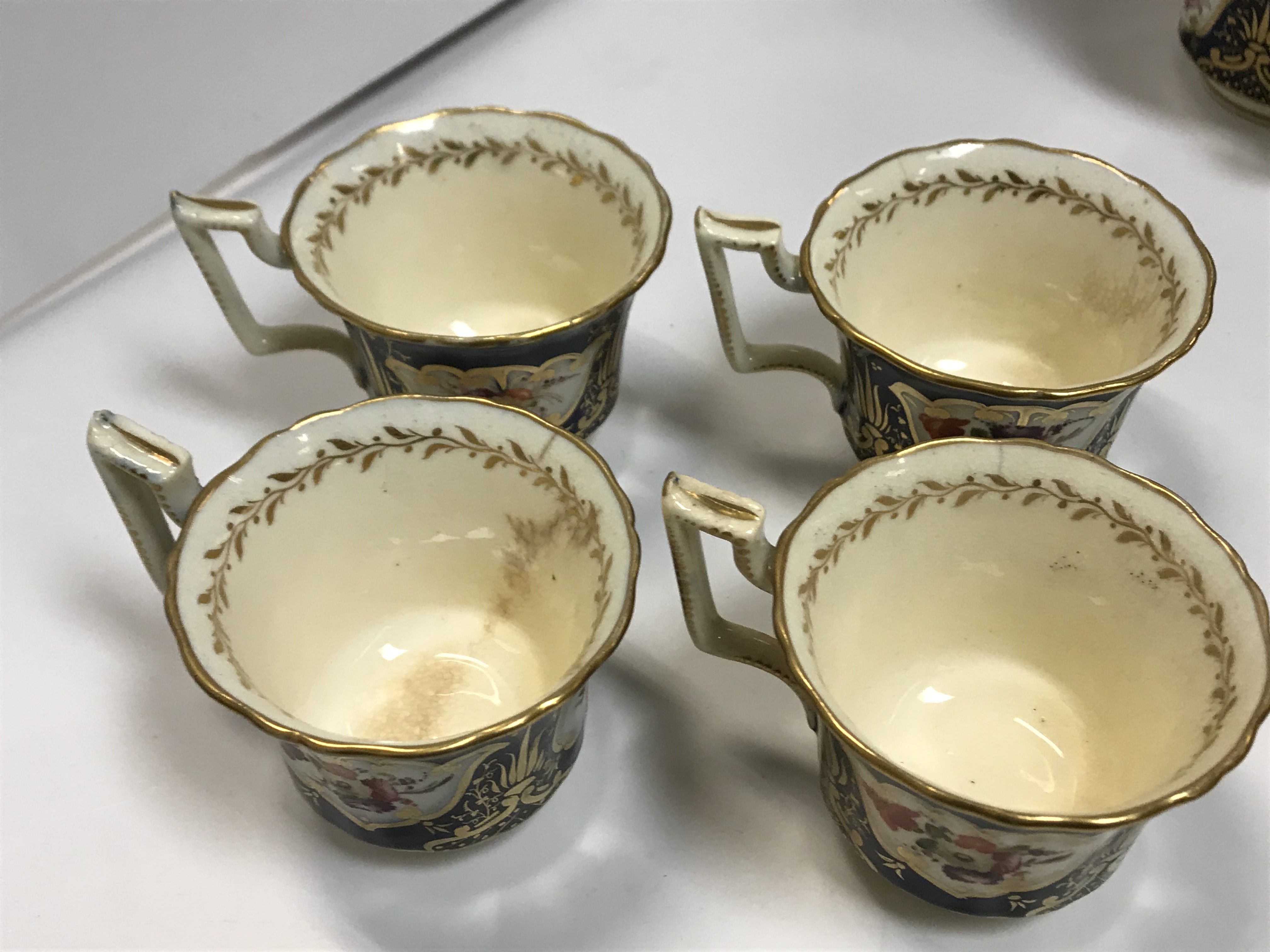 A 19th Century Staffordshire pottery part tea set, royal blue banded and gilt lined with panels of - Image 24 of 45