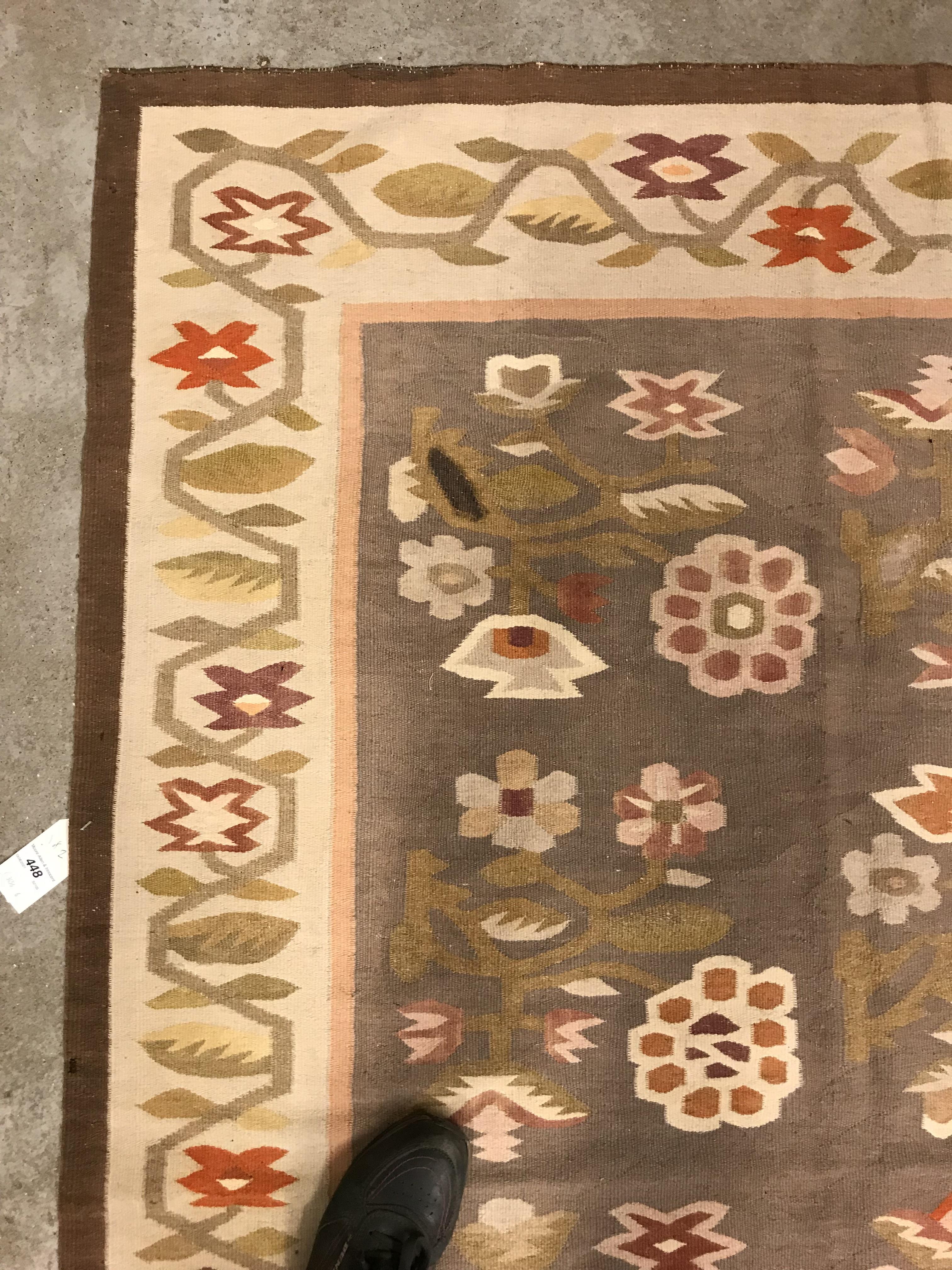 A Kelim rug, the central panel set with floral sprays on a mushroom ground, within a stepped border, - Image 6 of 16