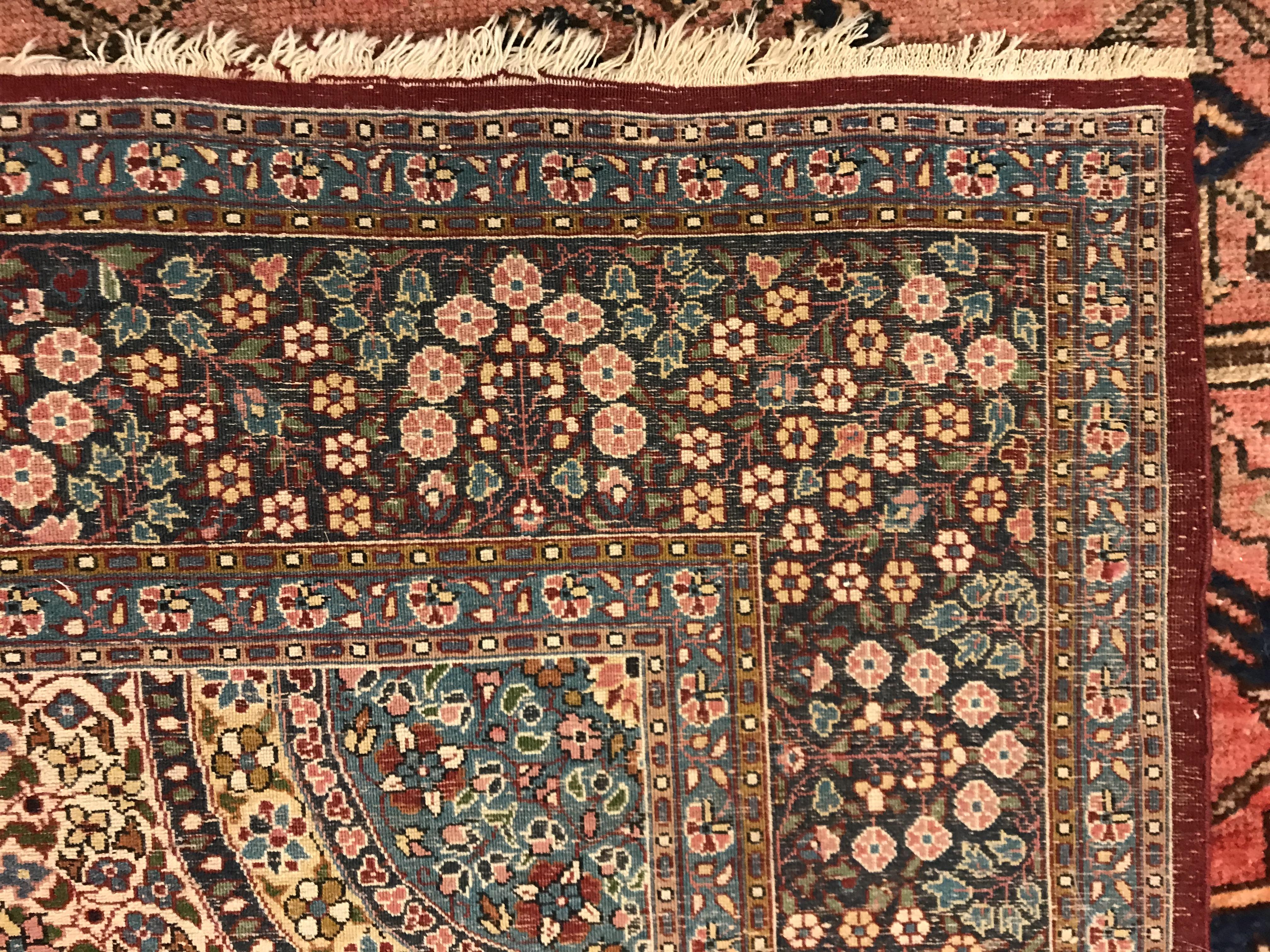A pair of fine Oriental rugs, the central panels each set with floral decorated circular medallion - Image 20 of 41