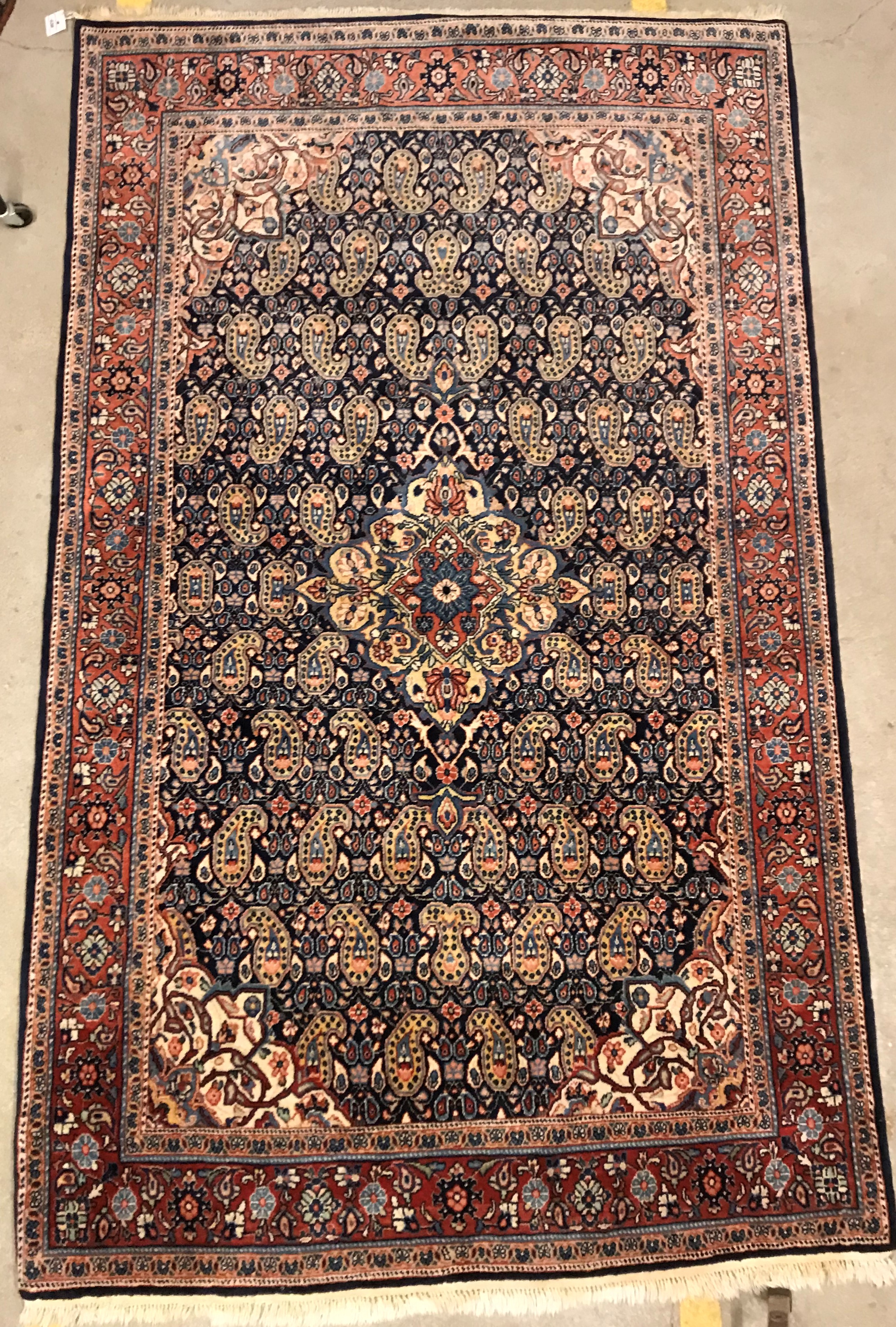 A Kashan carpet, the central panel set with floral decorated medallion on a dark blue hook decorated - Image 2 of 14