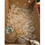 Three boxes of assorted glassware to include decanters, wine glasses, serving plates, etc,