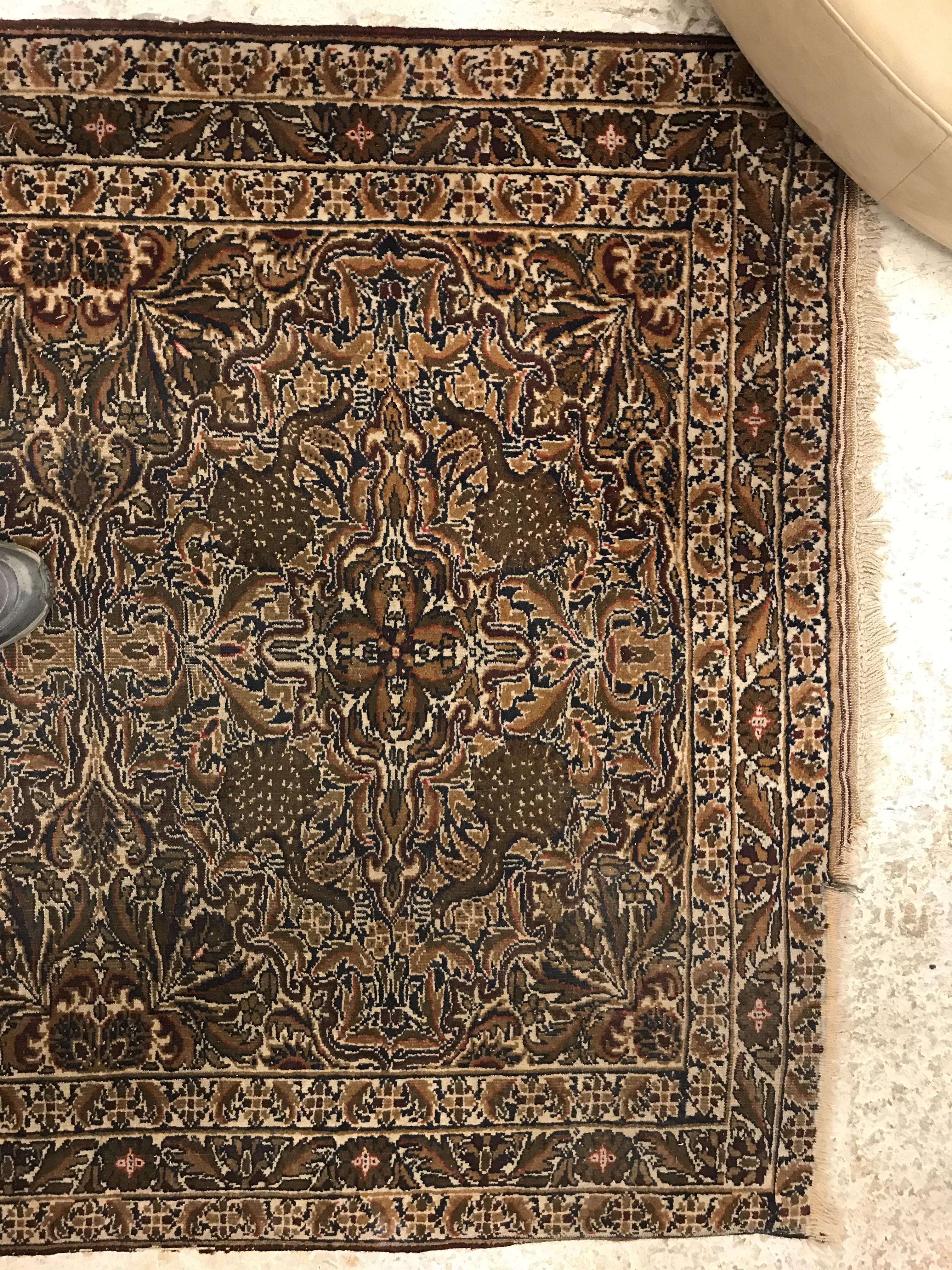 A Persian rug, the central panel set with a lozenge shaped medallion on a red floral decorated - Image 3 of 6