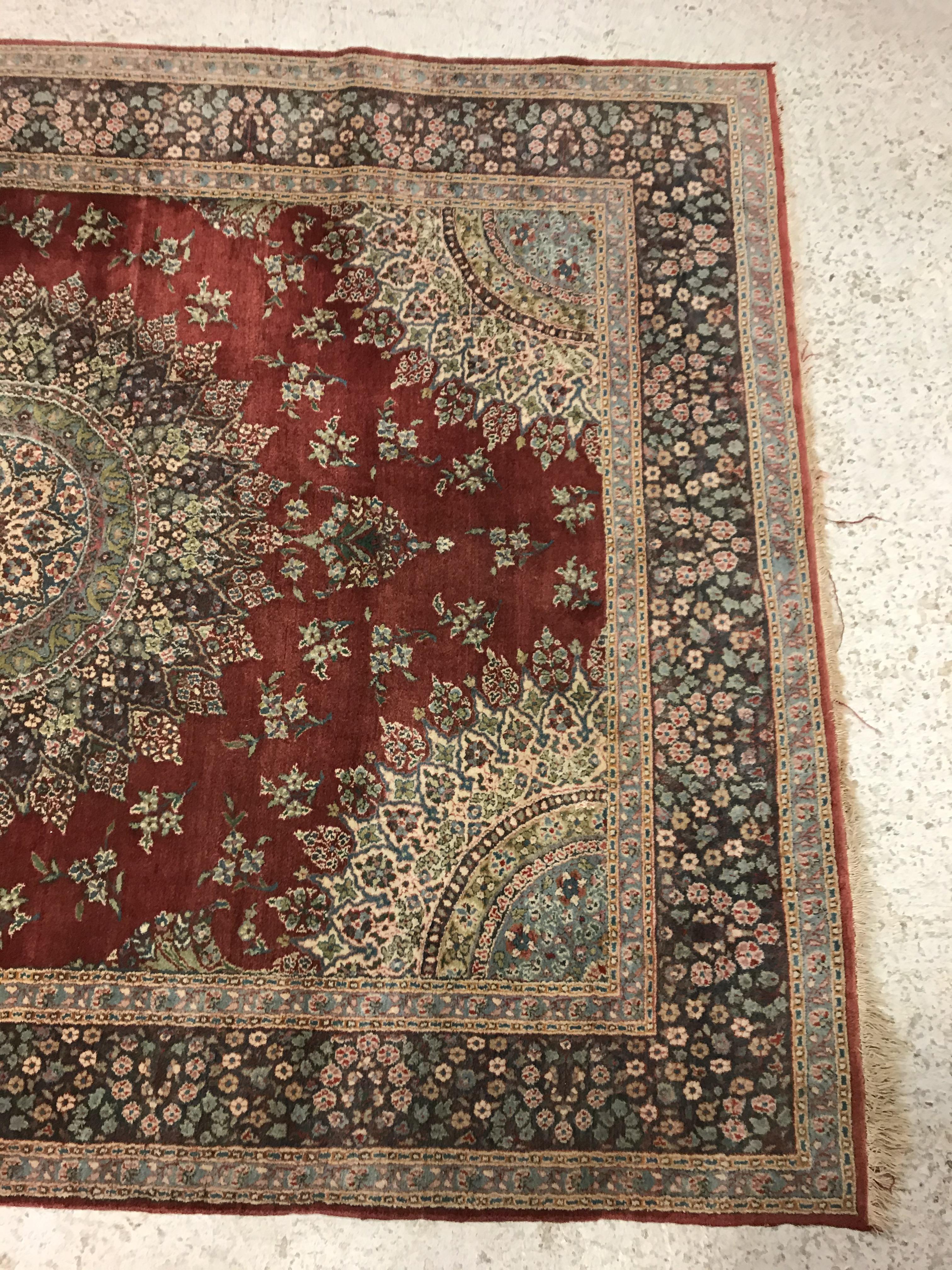 A pair of fine Oriental rugs, the central panels each set with floral decorated circular medallion - Image 5 of 41