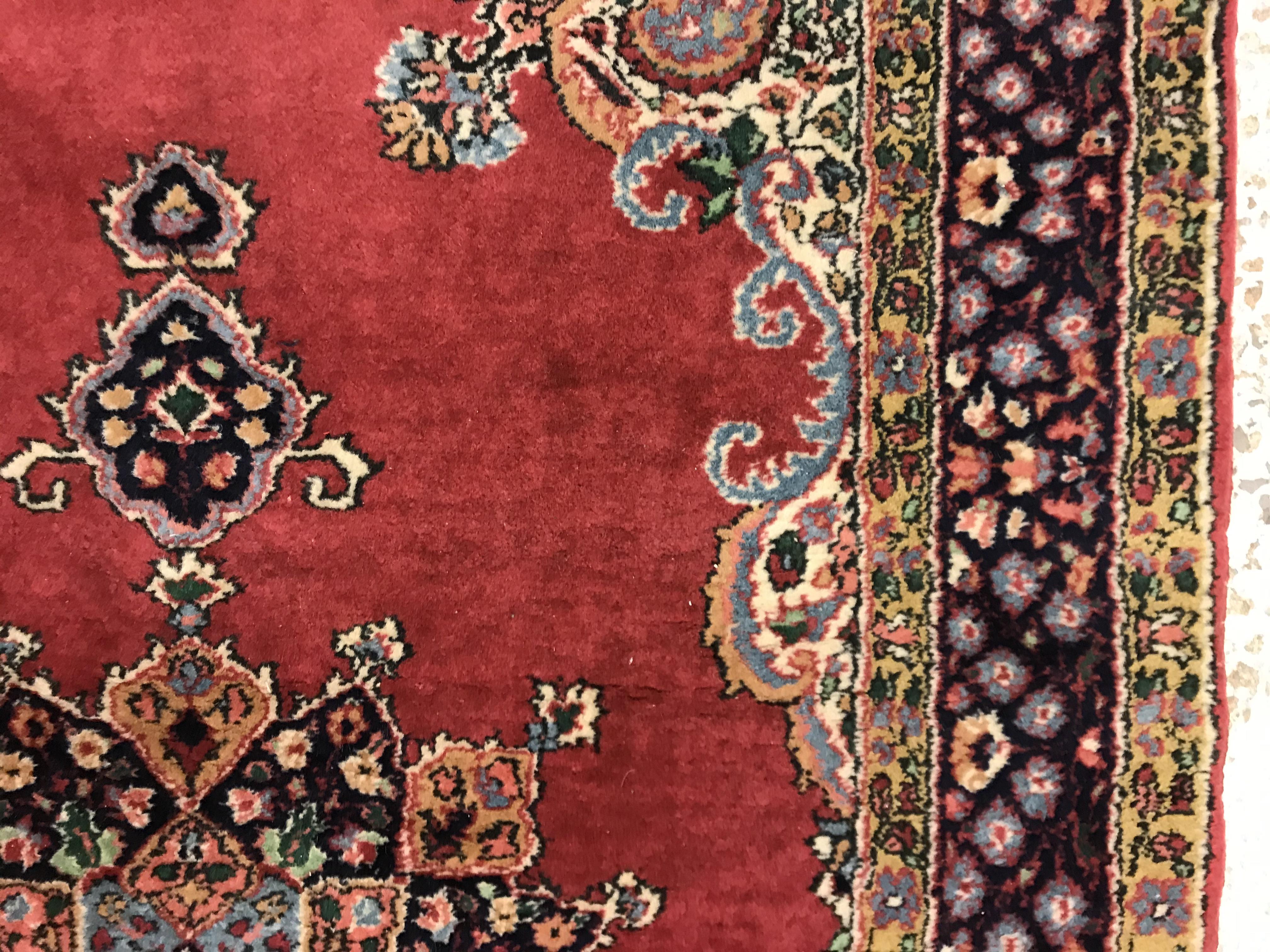 A pair of fine Oriental rugs, the central panels set with floral decorated circular medallion on a - Image 11 of 41