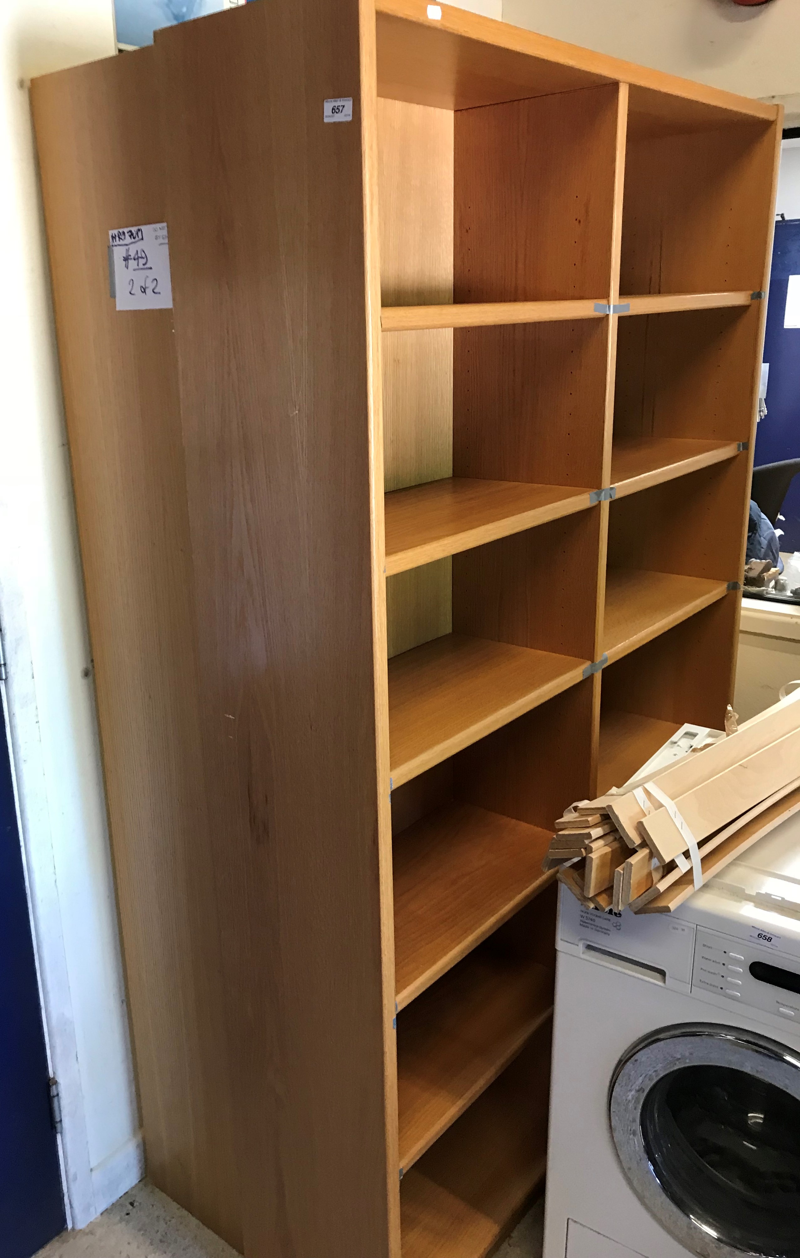 A pair of modern oak veneered Dansk open bookcases with adjustable shelving, each approx 122 cm wide