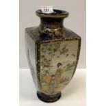 A Meiji Period Japanese Satsuma vase of tapering square form, decorated with panels of figures in