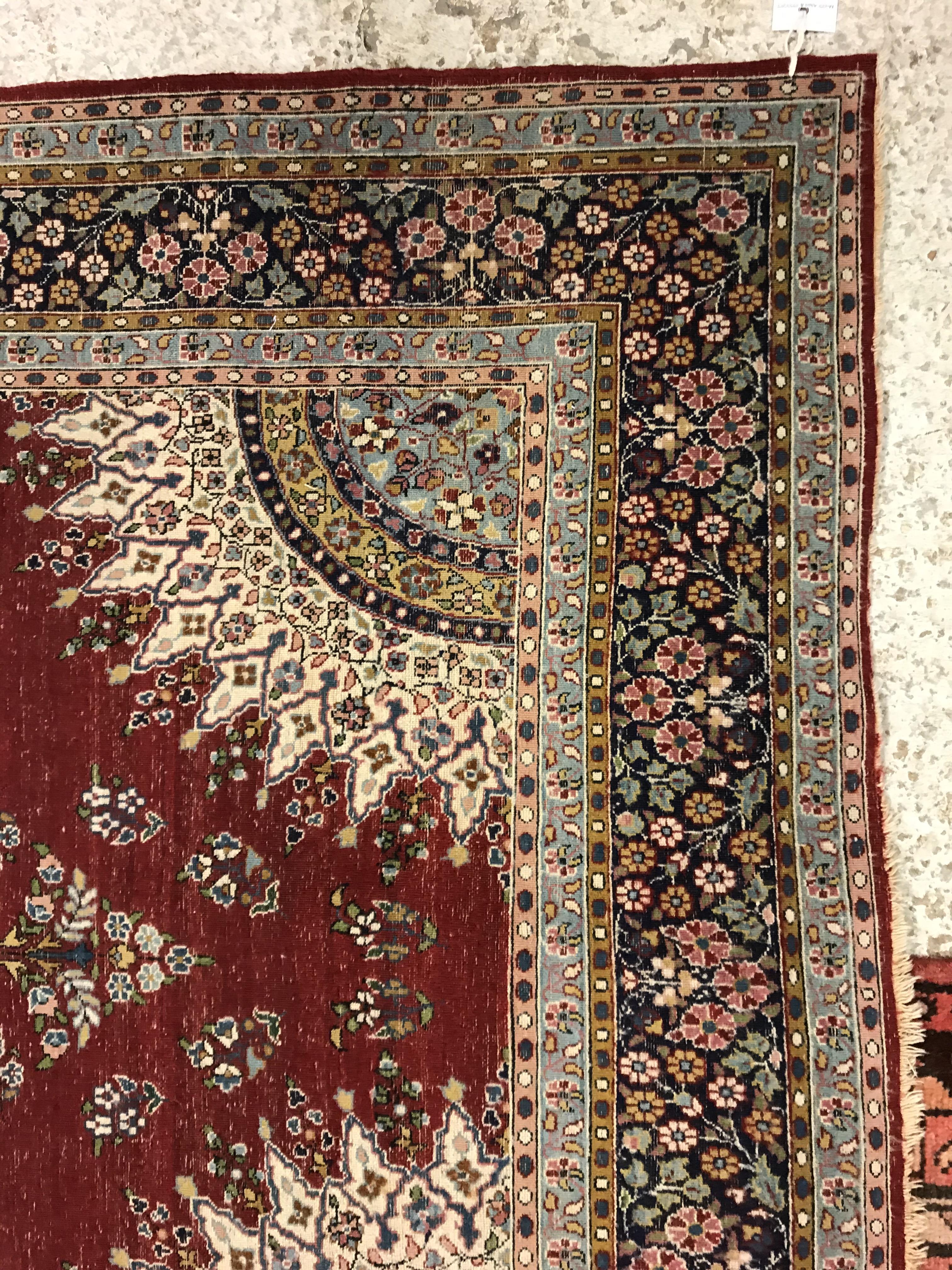 A pair of fine Oriental rugs, the central panel set with floral decorated circular medallion on a - Image 31 of 48