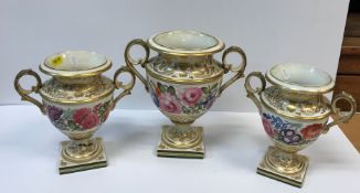 A collection of various 19th Century Derby china wares to include a pair of floral hand-painted urns