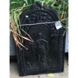 A cast iron fire back with Classical figure decoration, 57.5 cm wide x 91 cm high