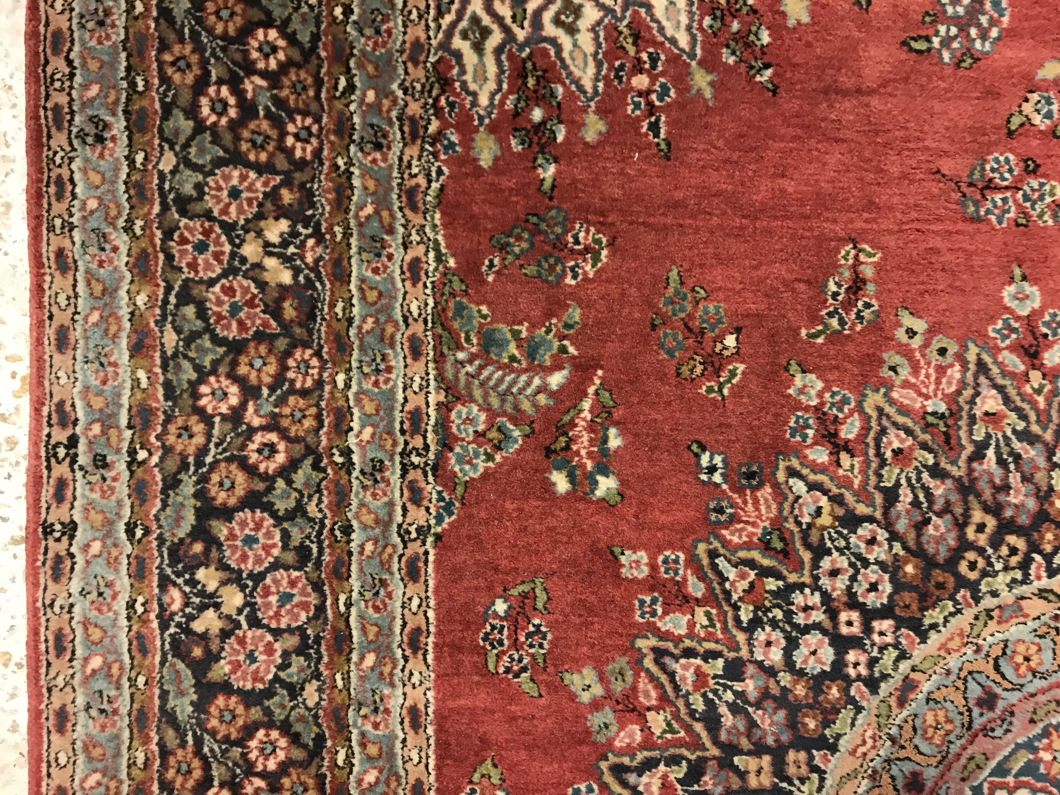 A pair of fine Oriental rugs, the central panel set with floral decorated circular medallion on a - Image 44 of 48